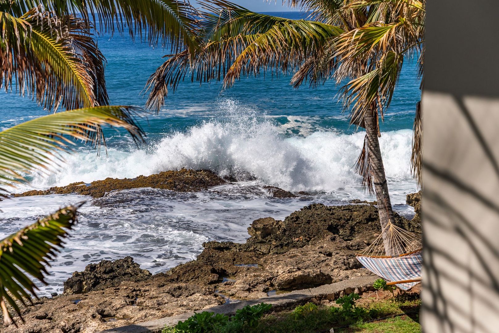 Waianae Vacation Rentals, Oceanfront Luxury Dream Estate - Ocean surf crashes against lava rocks just beyond your backyard for a dramatic coastal backdrop.