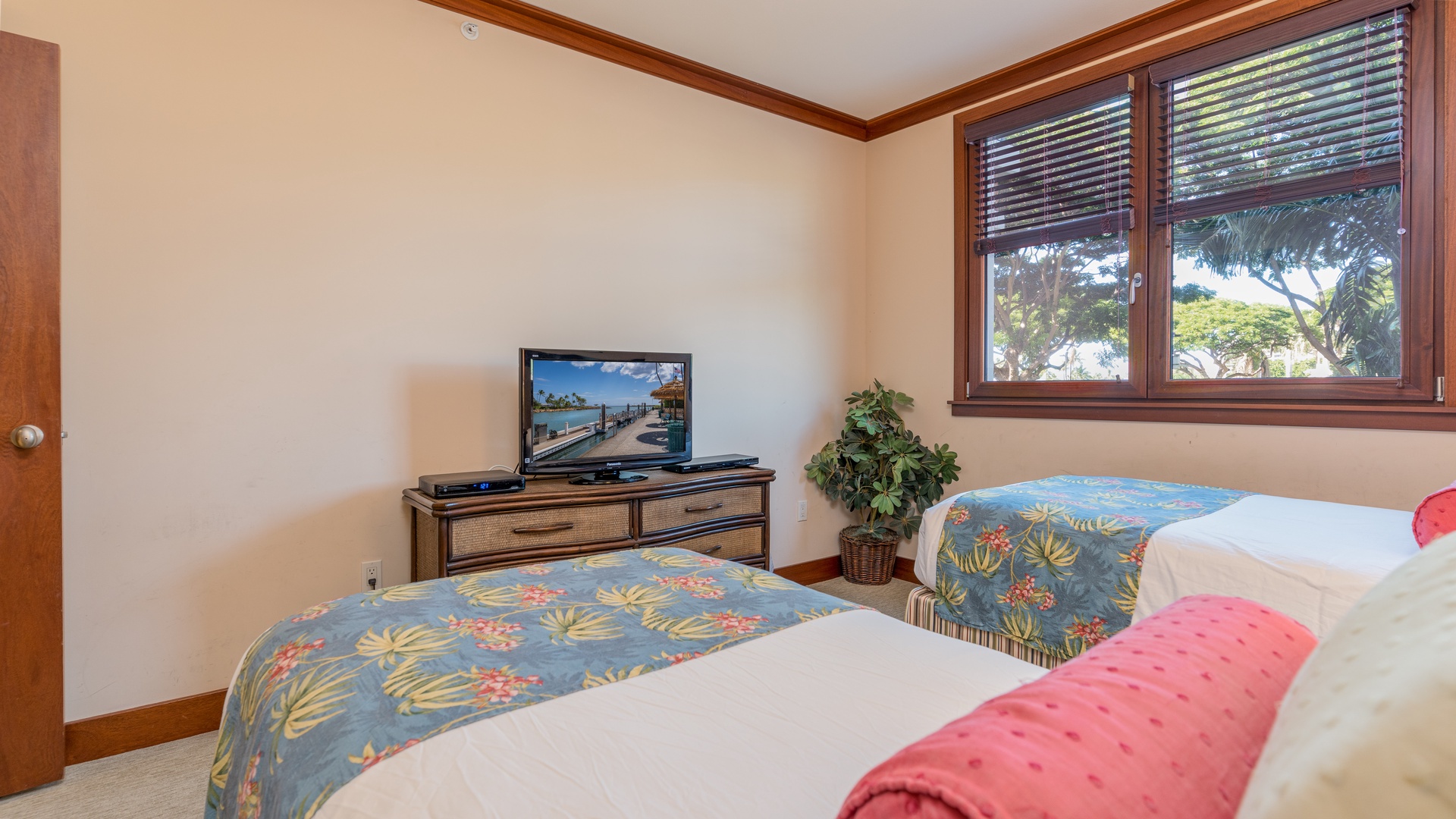 Kapolei Vacation Rentals, Ko Olina Beach Villas B202 - The second guest bedroom TV and dresser.