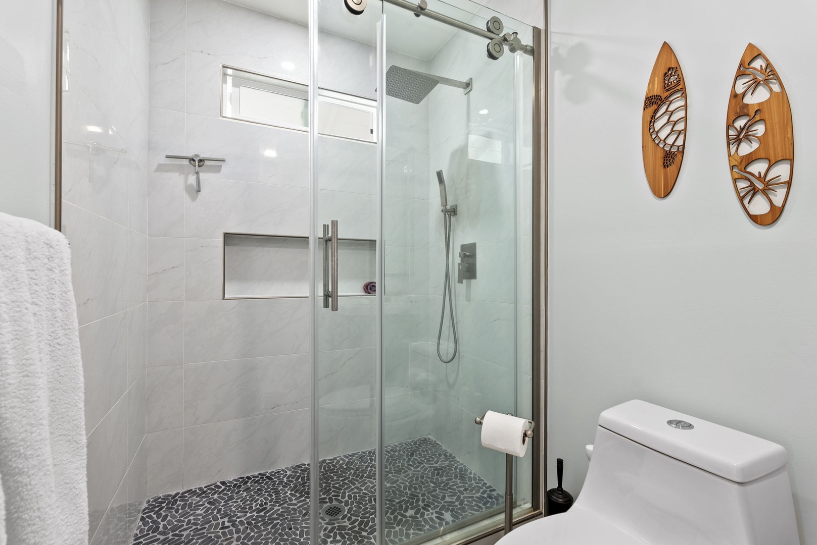 Kailua Vacation Rentals, Hale Alapi'i Lanikai Getaway - Step into this sleek, contemporary shower, designed with glass doors and minimalist details.