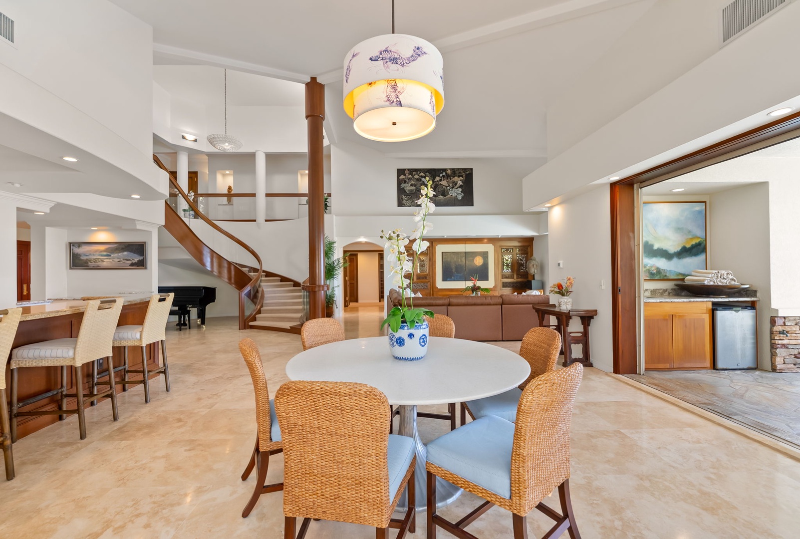 Honolulu Vacation Rentals, Maunalua Estate - Warm wood finishes, natural light, and graceful design create an inviting space to reconnect.