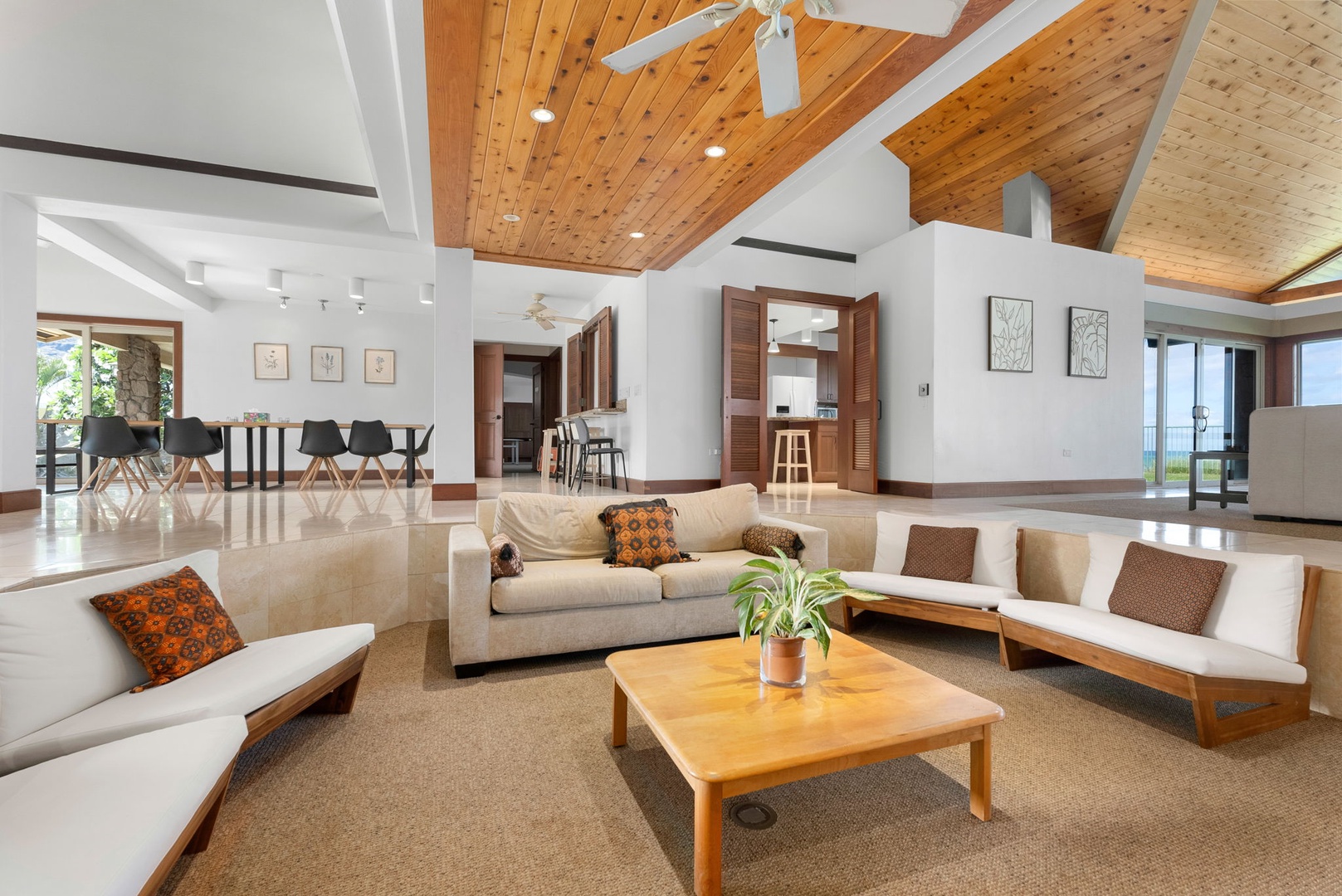 Waianae Vacation Rentals, Konishiki Beachhouse - 4BD - Open-concept living space seamlessly connecting indoors to the tropical outdoors.