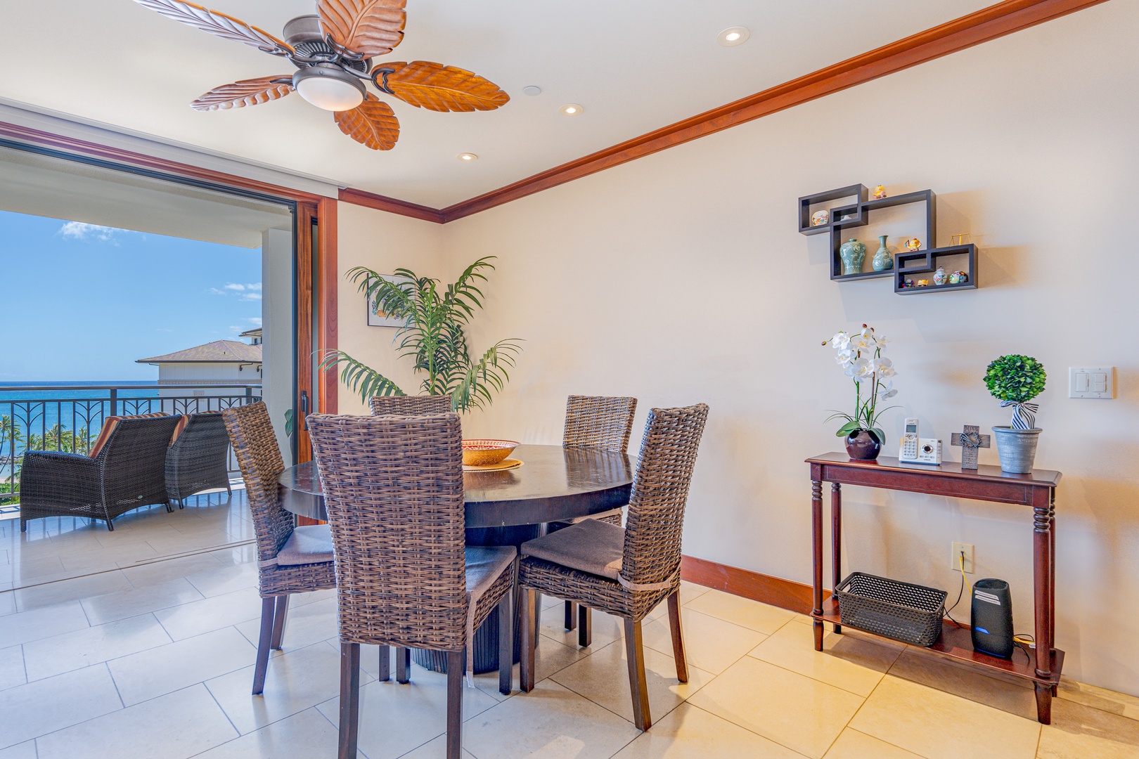 Kapolei Vacation Rentals, Ko Olina Beach Villas O904 - Game night after dinner at the dining table for happy memories.