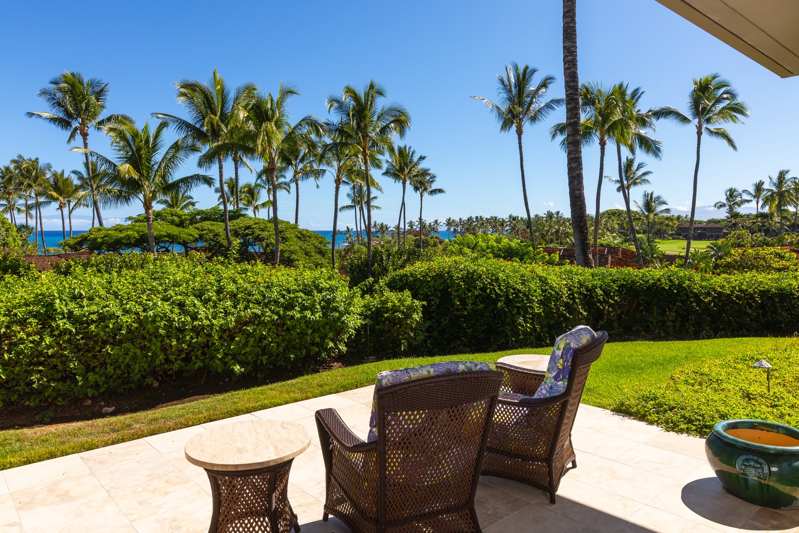 Kailua Kona Vacation Rentals, 2BD Hillside Villa (4102) at Hualalai Resort - Lanai seating area with unobstructed ocean and palm views.