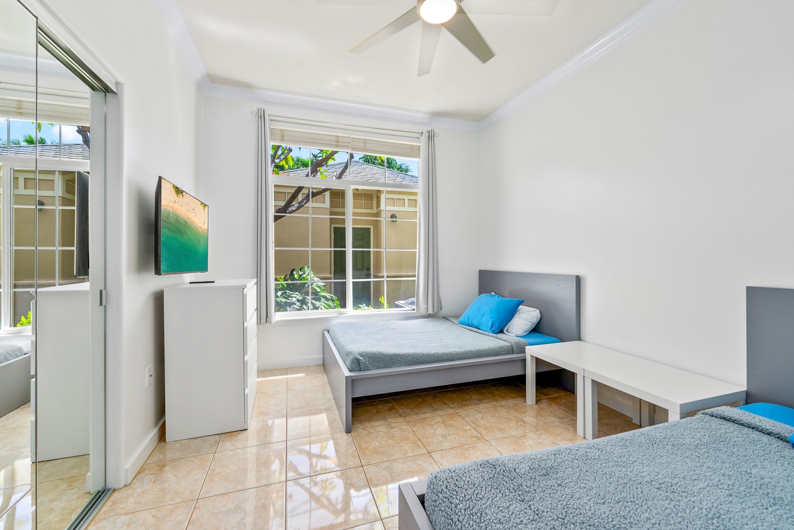 Kapolei Vacation Rentals, Kai Lani Luxury 6D - Twin bedroom with a window view and modern decor, offering a peaceful space for restful nights.