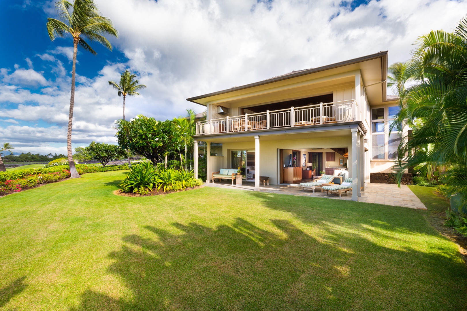 Kailua Kona Vacation Rentals, 3BD Ke Alaula Villa (210A) at Four Seasons Resort at Hualalai - Back of the villa showcasing upper and lower lanais and large private grassy lawn.