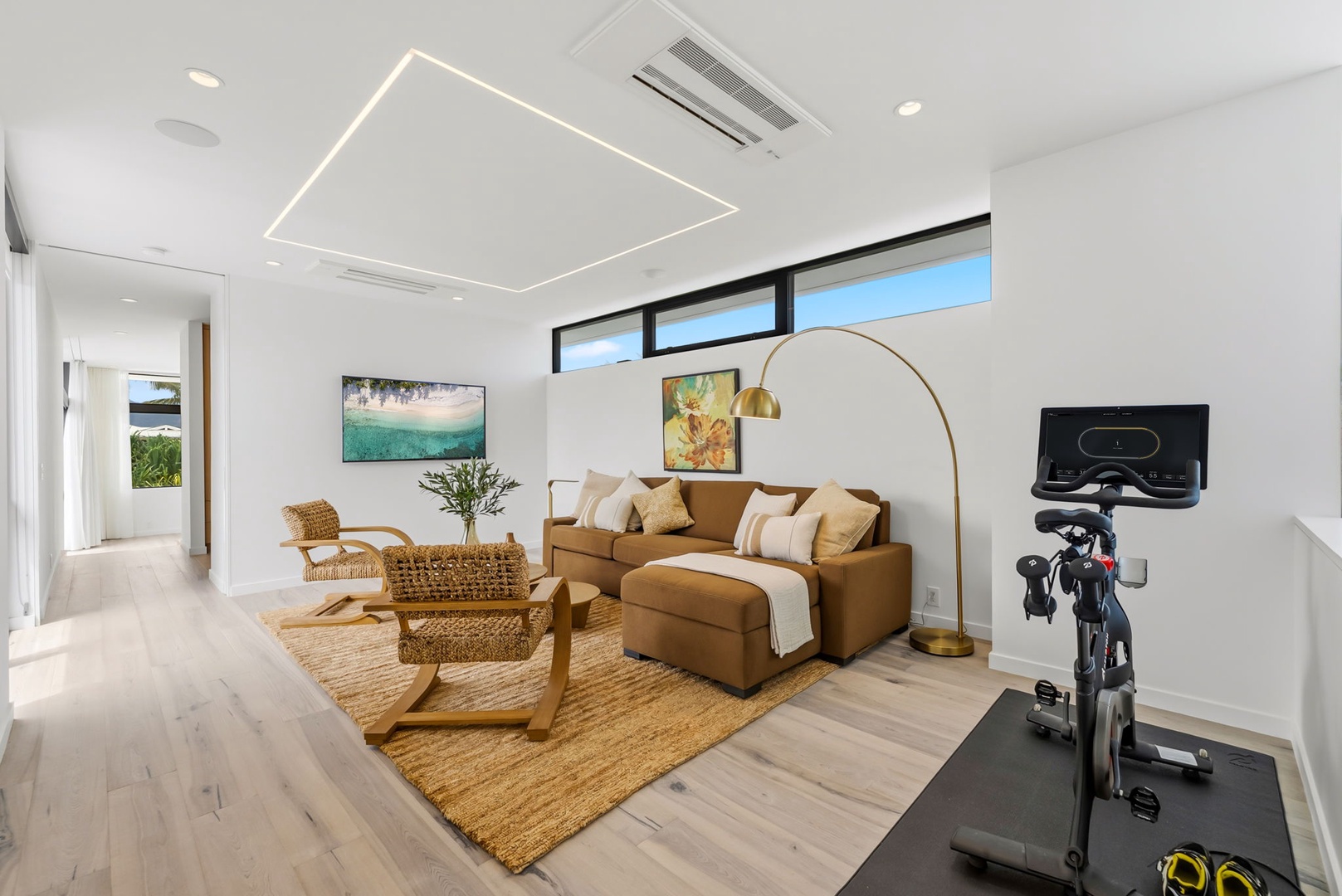 Kailua Vacation Rentals, Kailua Beach Escape - Settle in for movie nights, quiet reading, or even an afternoon ride on the in-home Peloton.