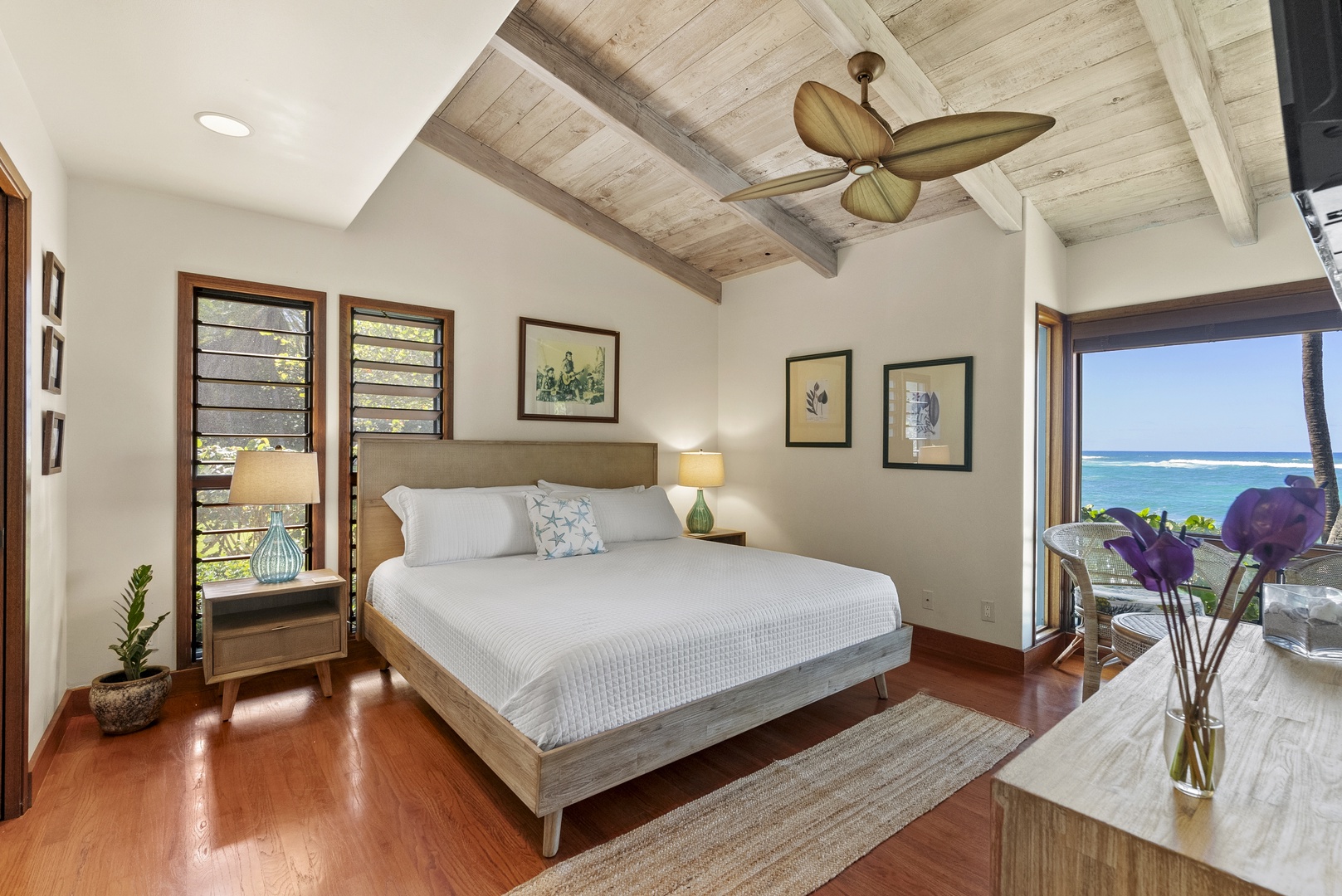 Haleiwa Vacation Rentals, Maluhia Beach House - Spacious bedroom with a king-size bed and stunning ocean views.