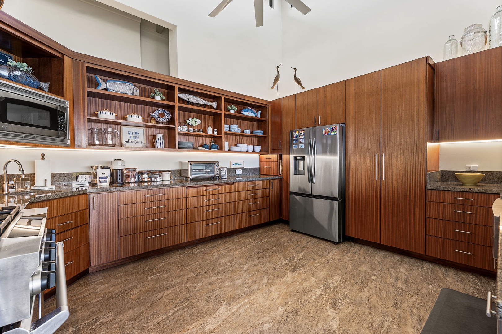 Kamuela Vacation Rentals, Island Time Retreat - Wood cabinetry and a big fridge provide plenty of storage for cooking throughout your stay.