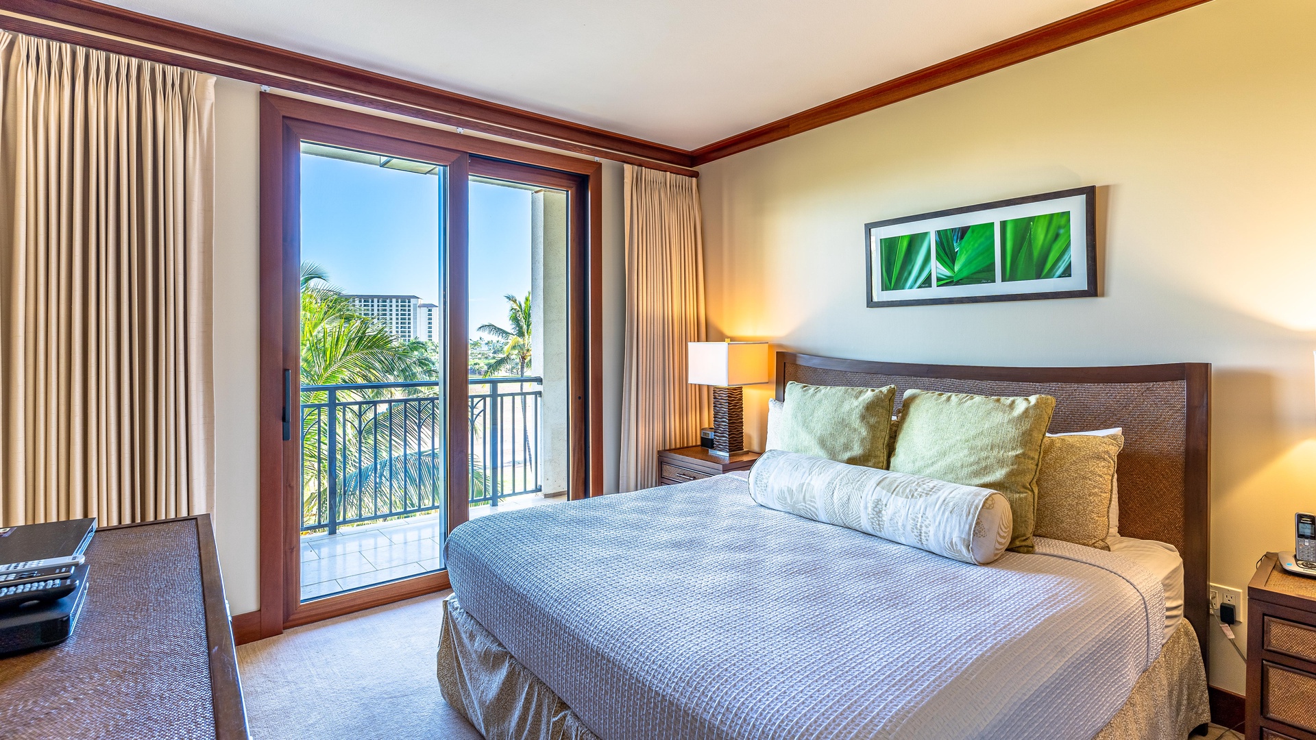 Kapolei Vacation Rentals, Ko Olina Beach Villas B505 - The primary guest bedroom with lanai access.