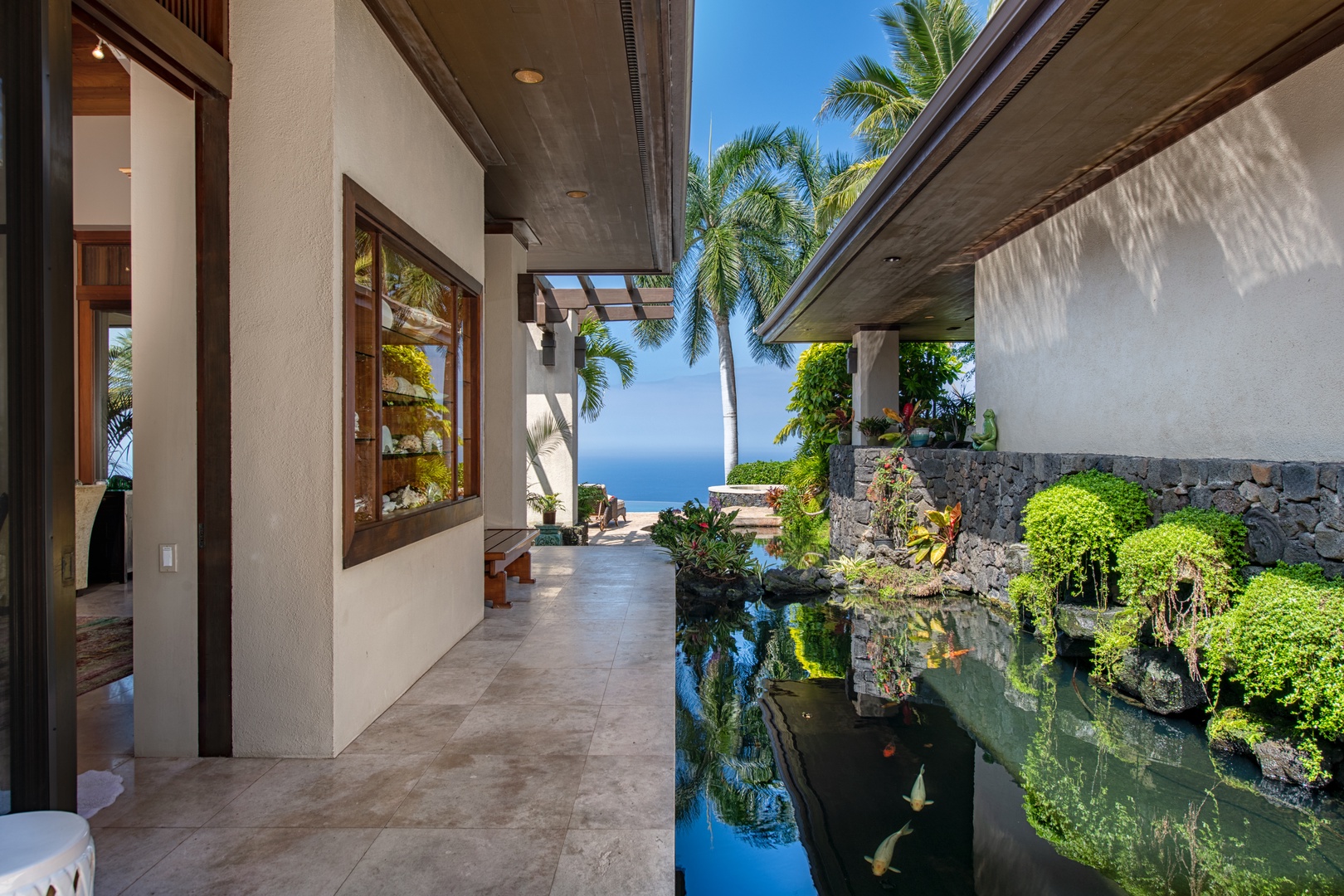 Kailua Kona Vacation Rentals, Hale Wailele** - French Limestone walkways connect each pavilion