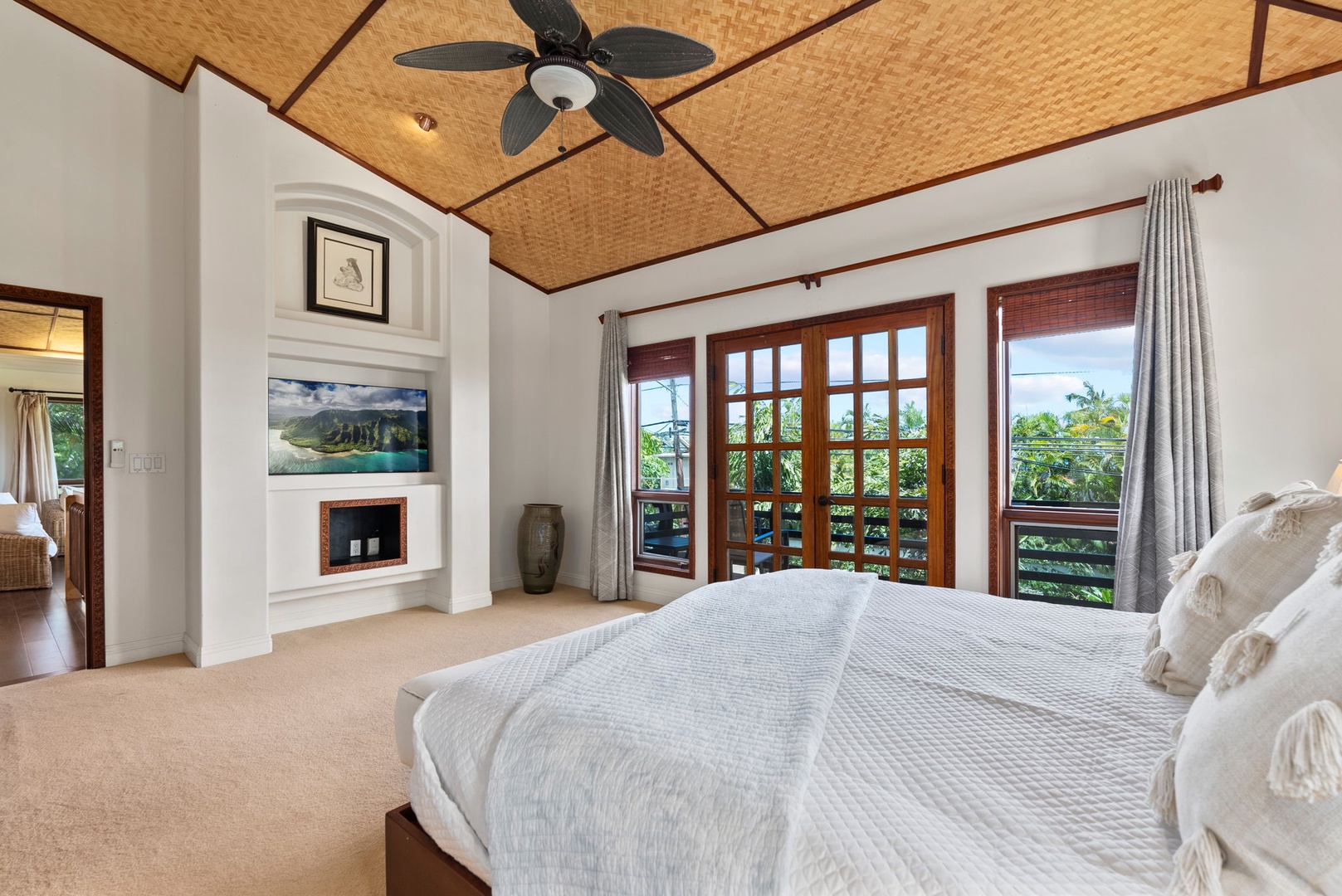 Haleiwa Vacation Rentals, Kealoha Tropical Beach Villa - The suite features a cozy king bed and direct access to a private deck, perfect for morning coffee.