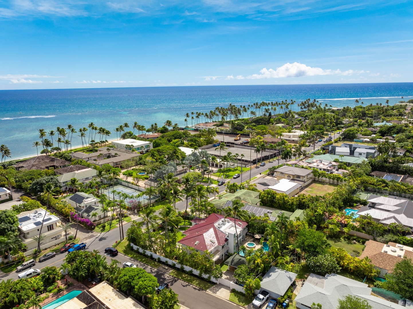 Honolulu Vacation Rentals, Kahala Oasis - Aerial view of the coastal neighborhood, highlighting the villa’s ideal location near the shoreline.