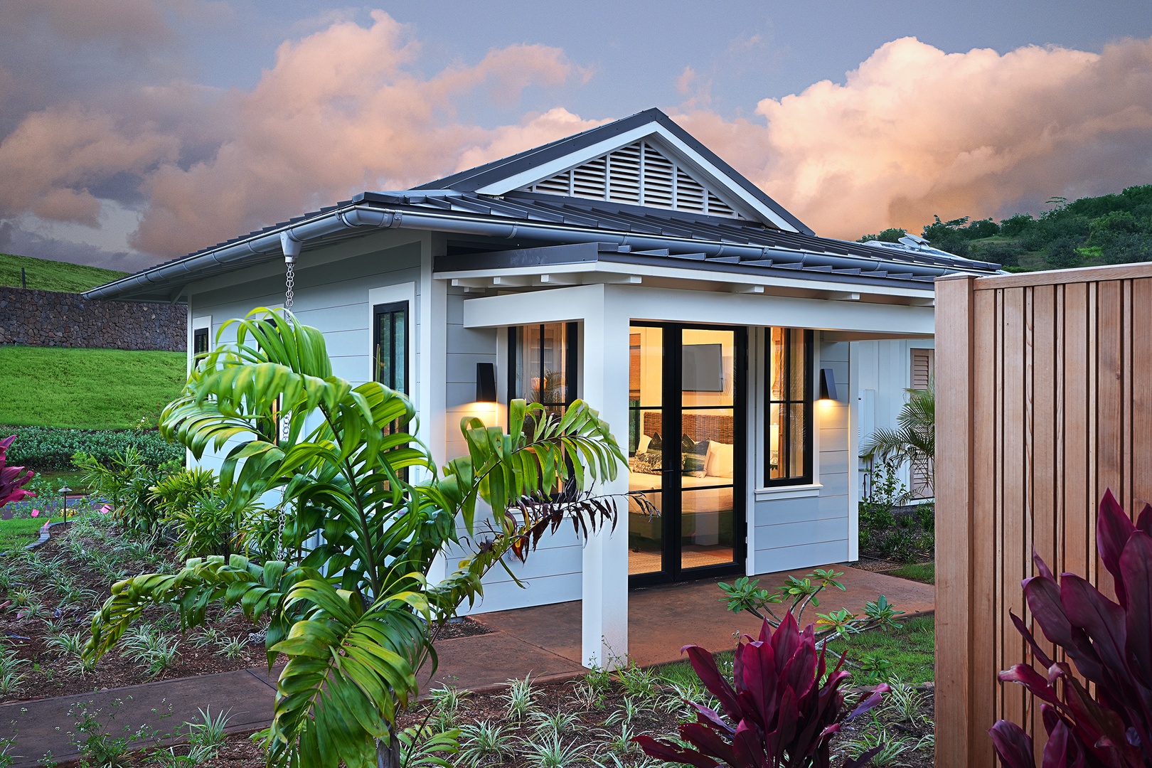 Koloa Vacation Rentals, Hali'a Mai - Tropical plantings frame the entry path, the home easing into its garden setting.