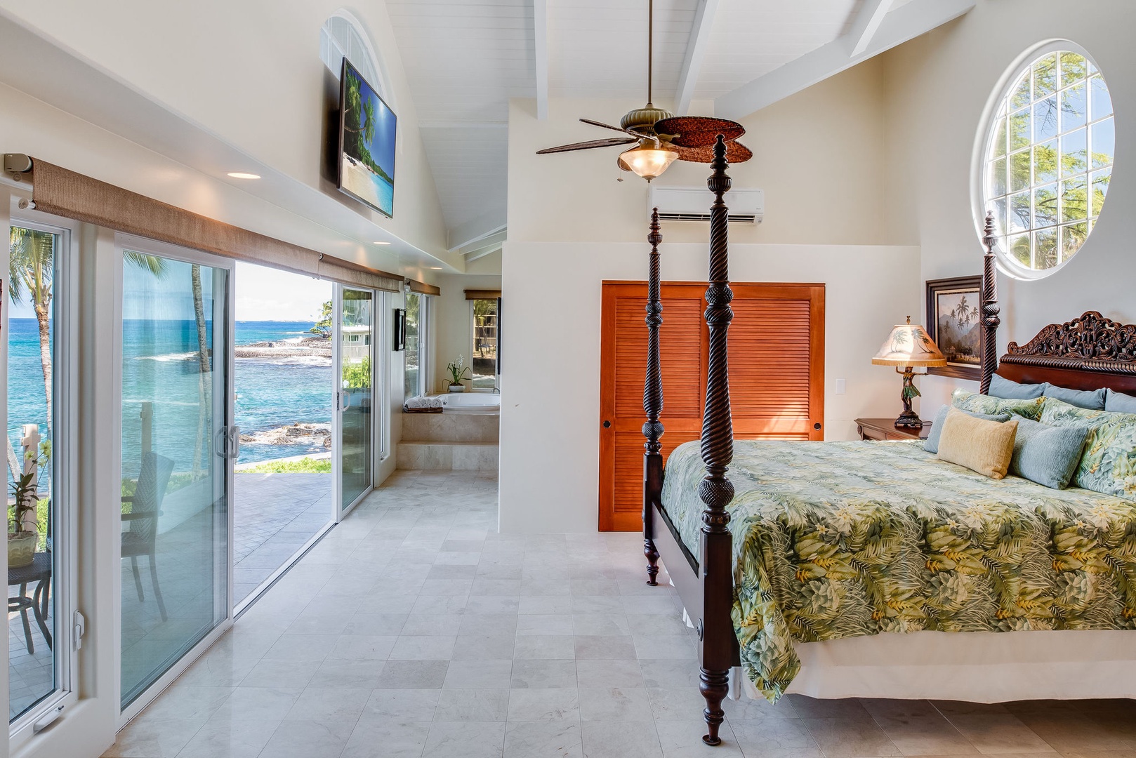 Kailua Kona Vacation Rentals, Kona Beach Bungalows** - Experience grandeur in the Lihikai Master Suite, boasting a plush king bed, state-of-the-art TV, and a luxurious spa-inspired ensuite.