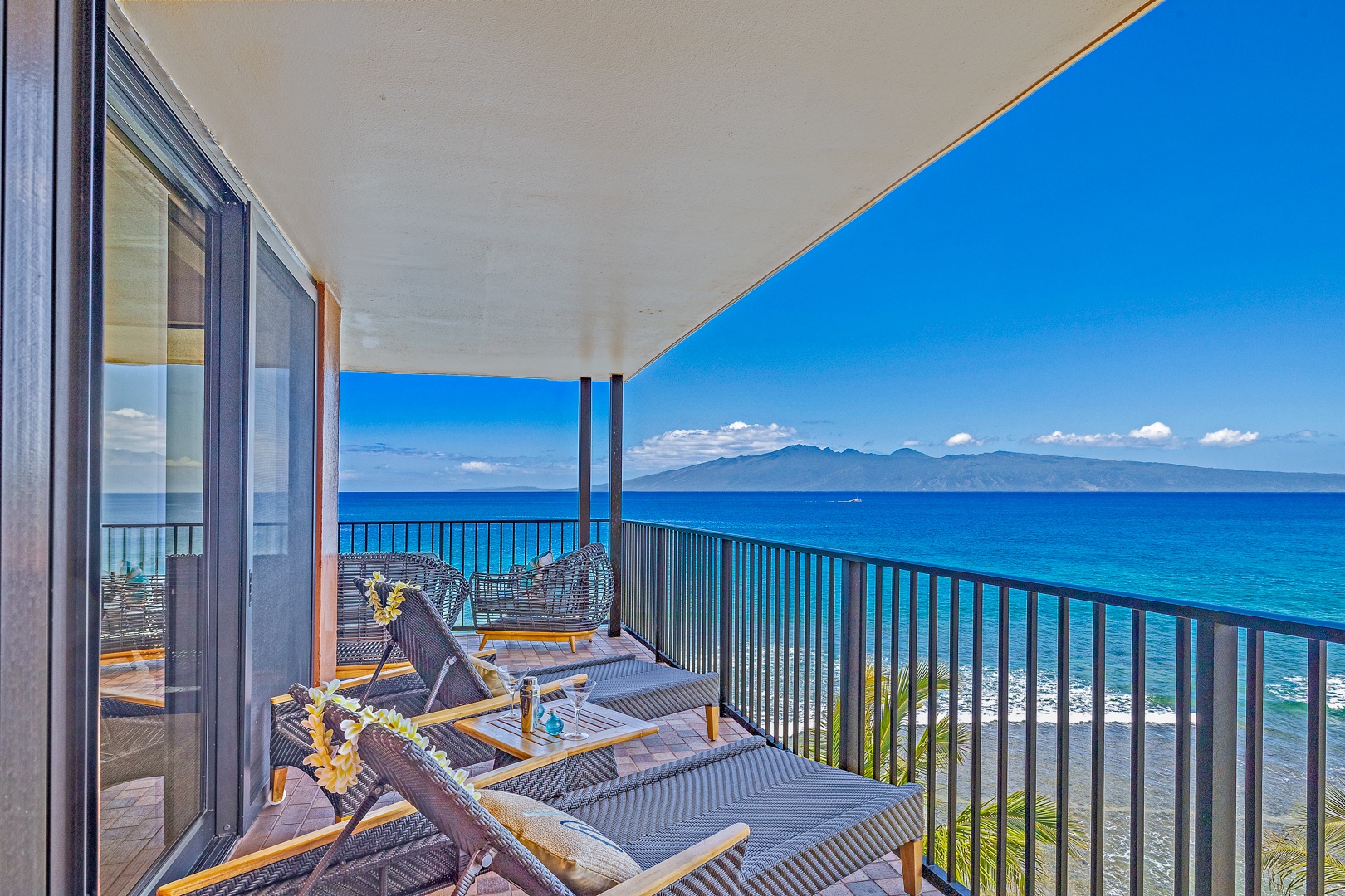 Lahaina Vacation Rentals, Kaanapali Shores 702 - Enjoy breathtaking ocean views from Kaanapali Shores 702’s spacious lanai with comfy lounge chairs.