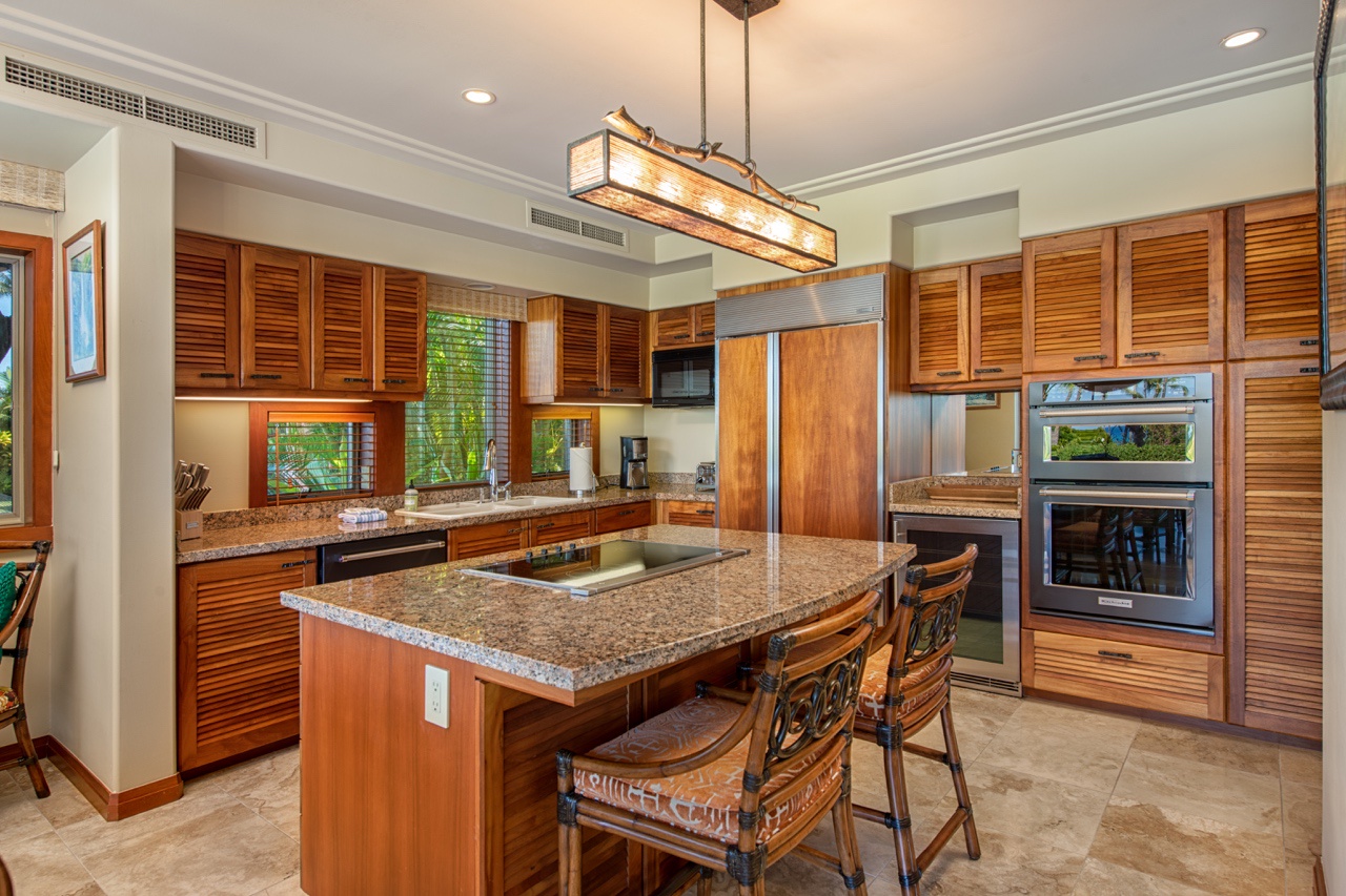 Kailua Kona Vacation Rentals, 2BD Hillside Villa (4102) at Hualalai Resort - Indulge your culinary delights in the kitchen area with top-tier appliances, plenty of storage and counter spaces.