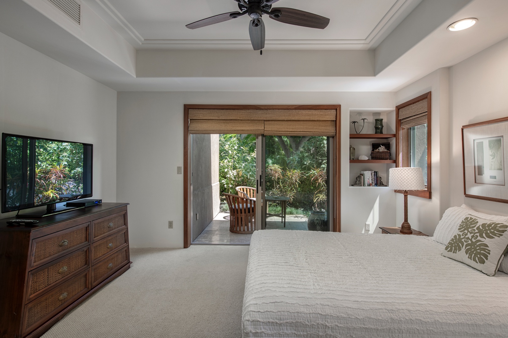 Kailua Kona Vacation Rentals, 3BD Golf Villa (3101) at Four Seasons Resort at Hualalai - Third bedroom w/queen bed, sliding doors to private lanai & ensuite bath.