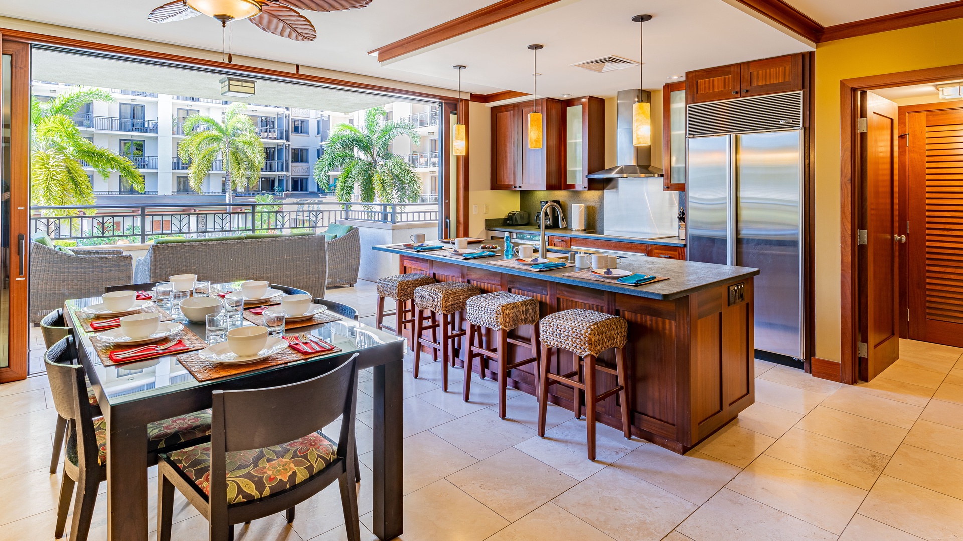 Kapolei Vacation Rentals, Ko Olina Beach Villas O224 - The kitchen with stainless steel appliances and island breezes from the lanai.