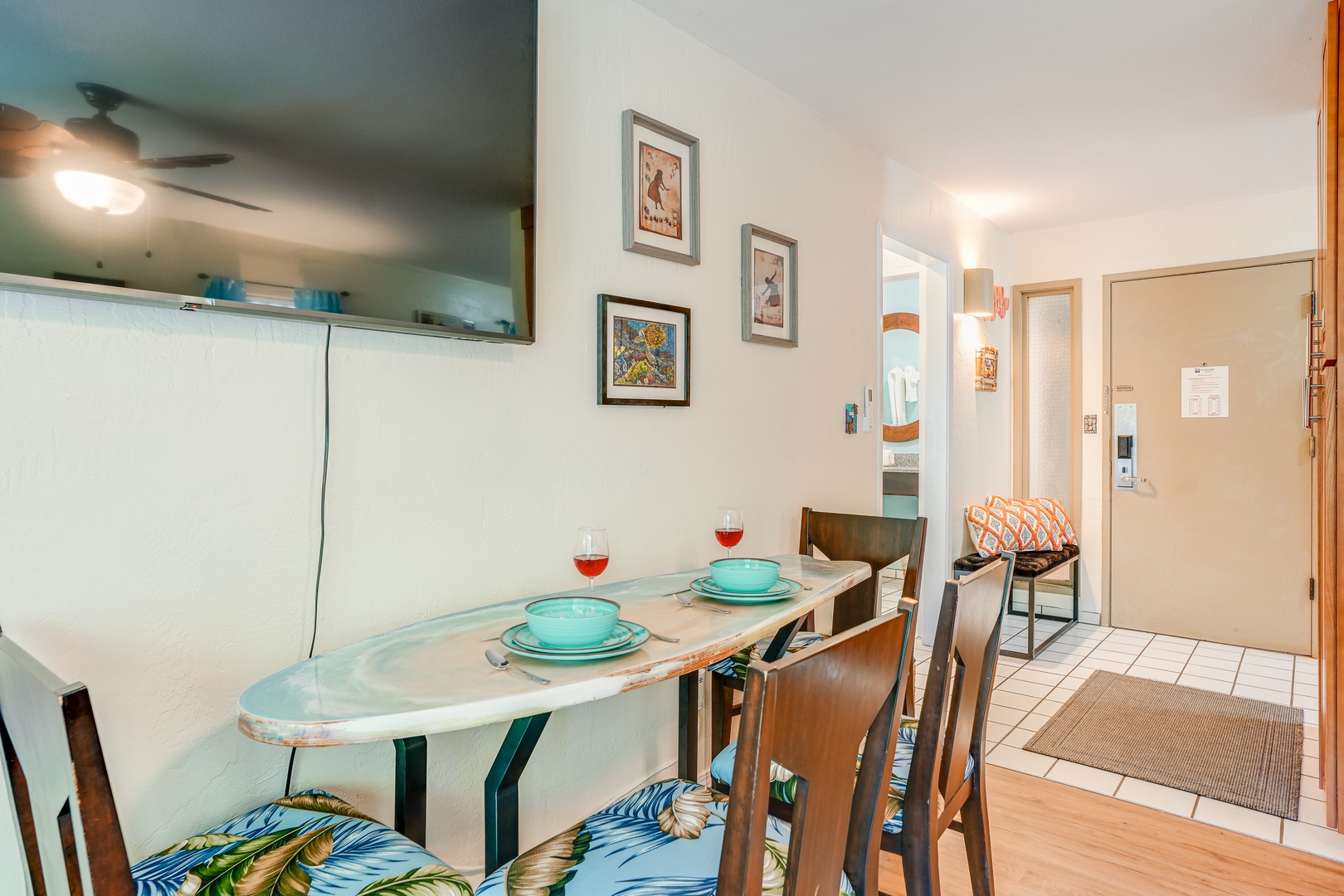 Kapaa Vacation Rentals, Nani Hale - Enjoy casual meals or tropical takeout at the charming surfboard-inspired dining table with seating for four.