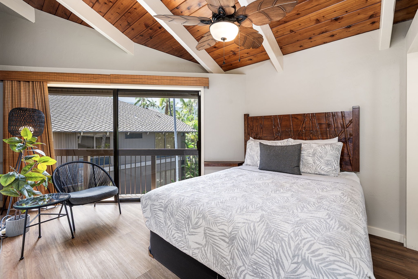 Kailua Kona Vacation Rentals, Kanaloa at Kona 1606 - A queen bed with its own slice of lanai through the sliding door.