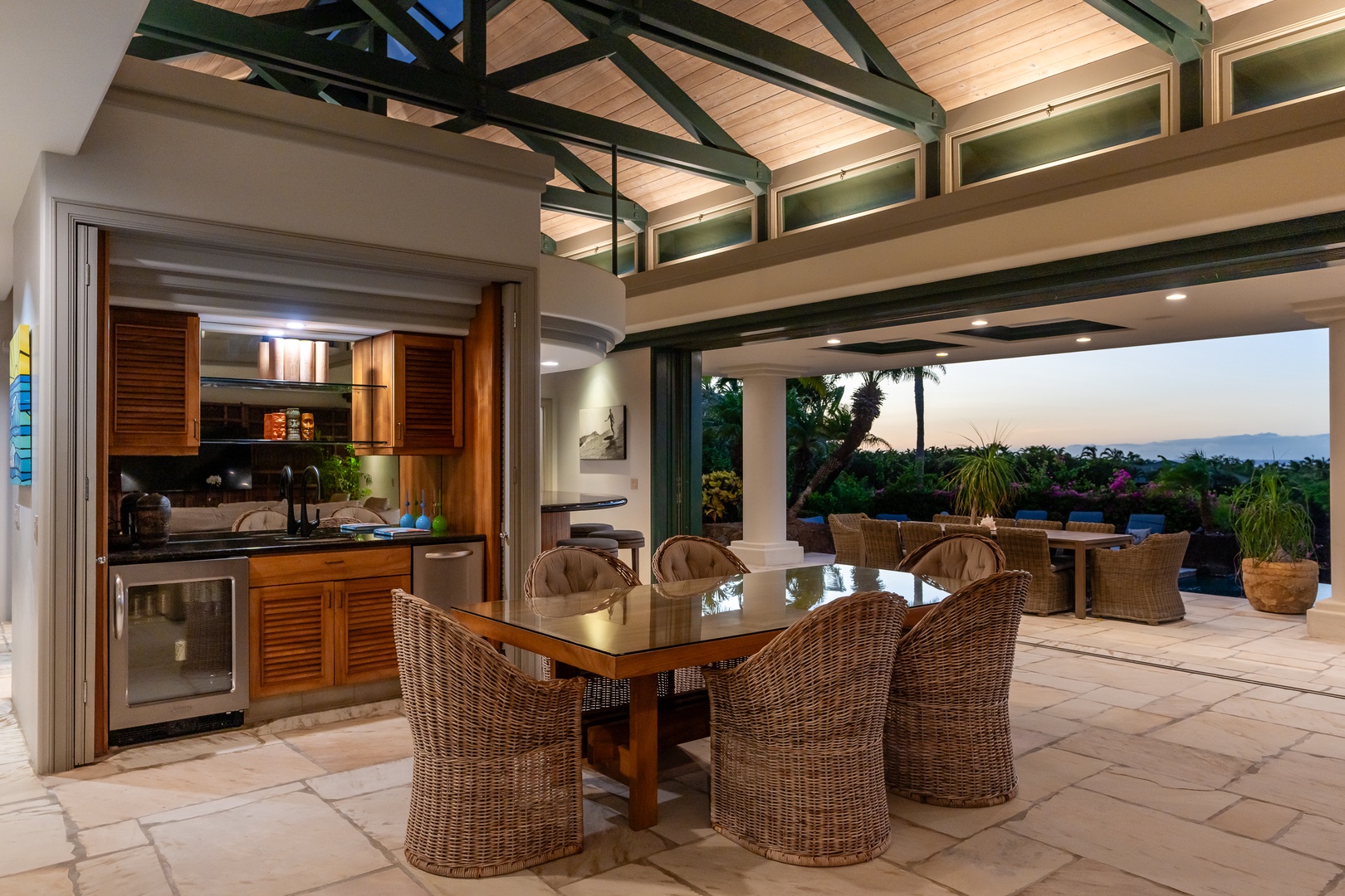 Kamuela Vacation Rentals, Champion Ridge 24 - Indoor-outdoor dining area with comfortable wicker chairs and stunning views.