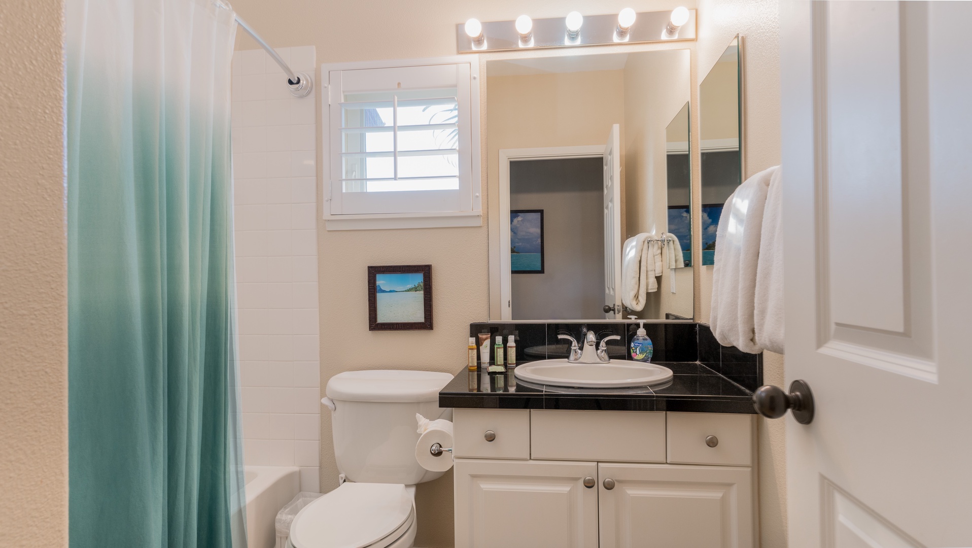 Kapolei Vacation Rentals, Coconut Plantation 1194-3 - The second guest bathroom vanity and natural lighting.