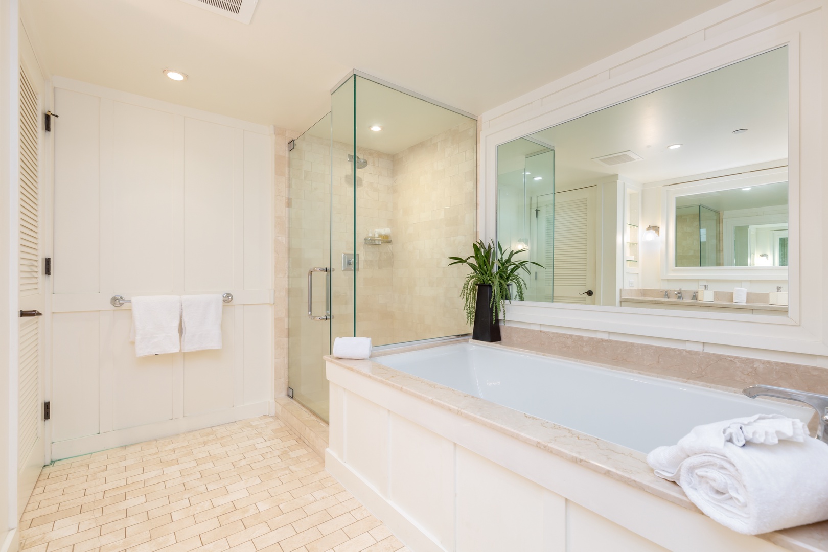 Kahuku Vacation Rentals, Turtle Bay Villas 101 - Primary Bathroom with walk in shower and tub