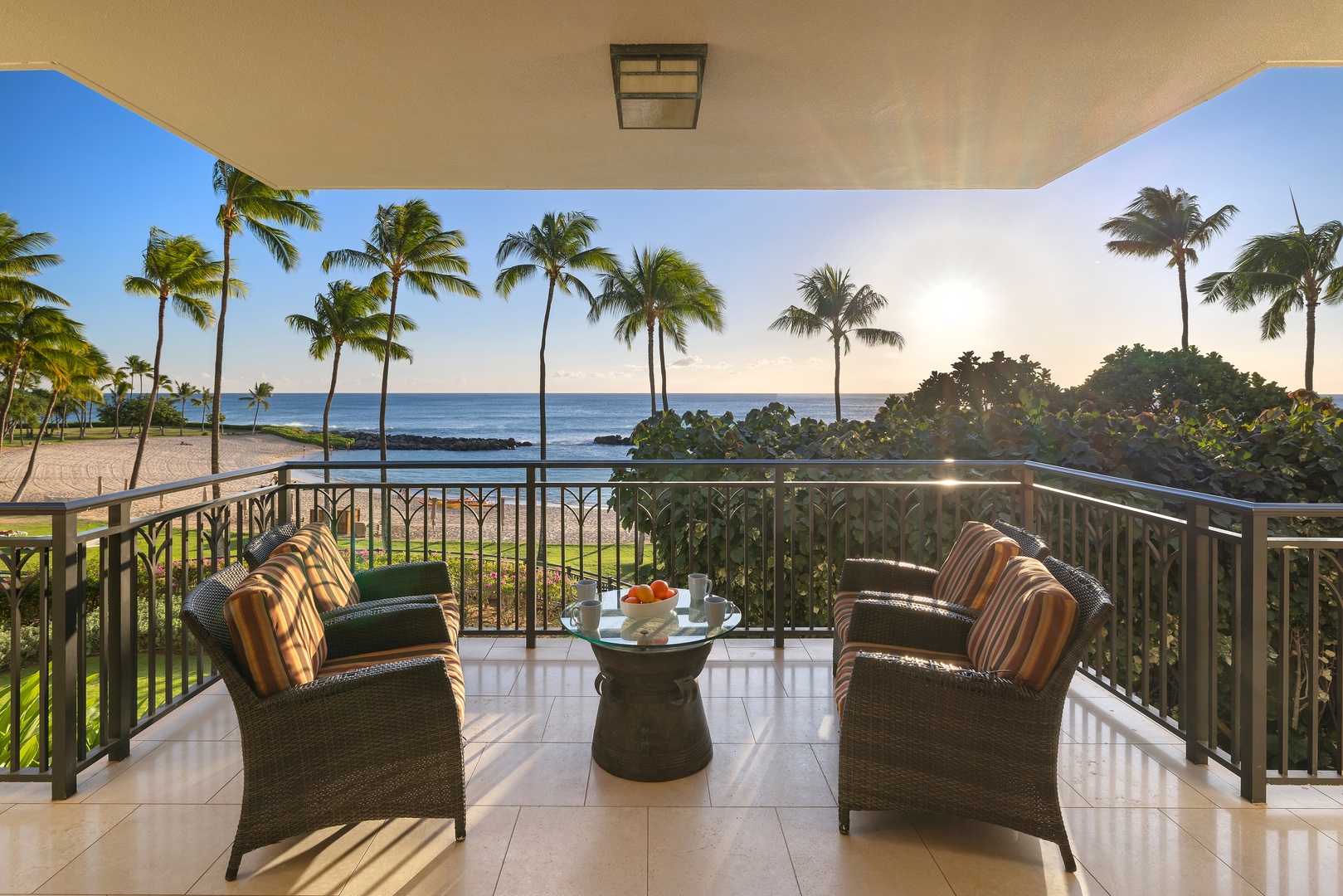 Kapolei Vacation Rentals, Ko Olina Beach Villas B210 - Oceanfront lanai with direct lagoon and sunset views.