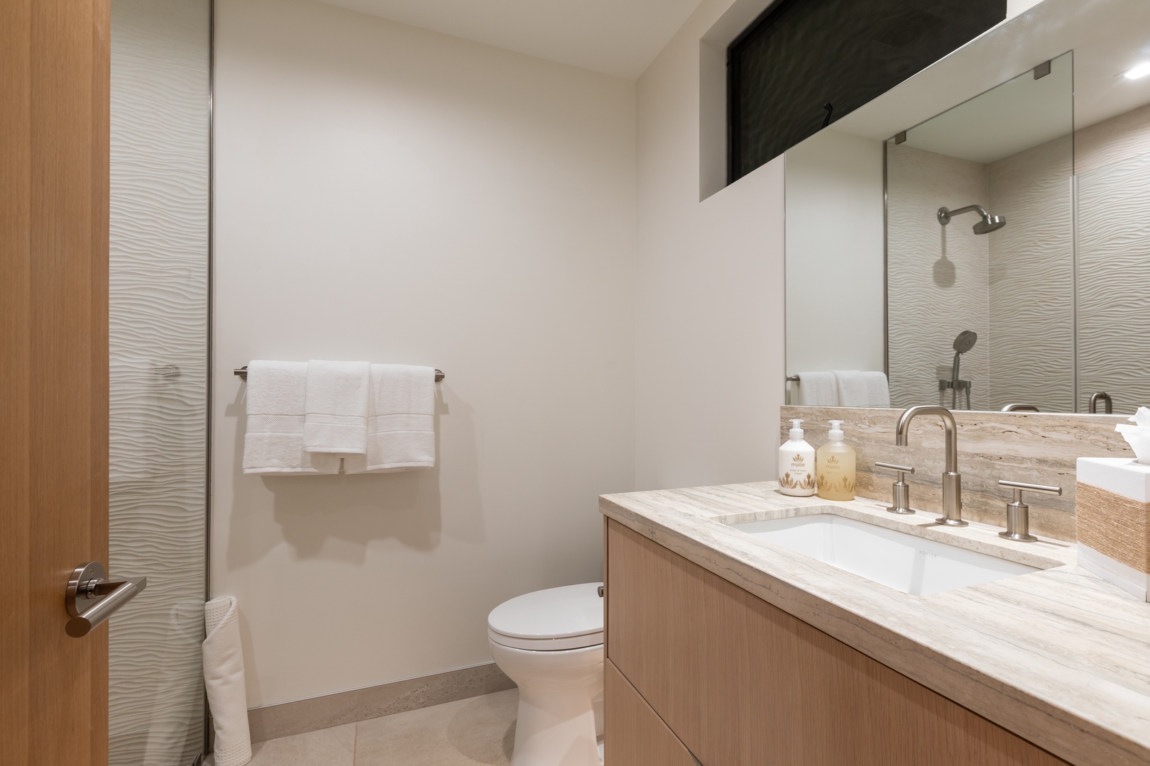 Kamuela Vacation Rentals, 5BD Mauna Lani Lux Ocean Estate (OE12) at One Ocean - Refresh in your modern bathroom with marble countertops, rainfall shower, and luxury amenities thoughtfully arranged for your comfort.