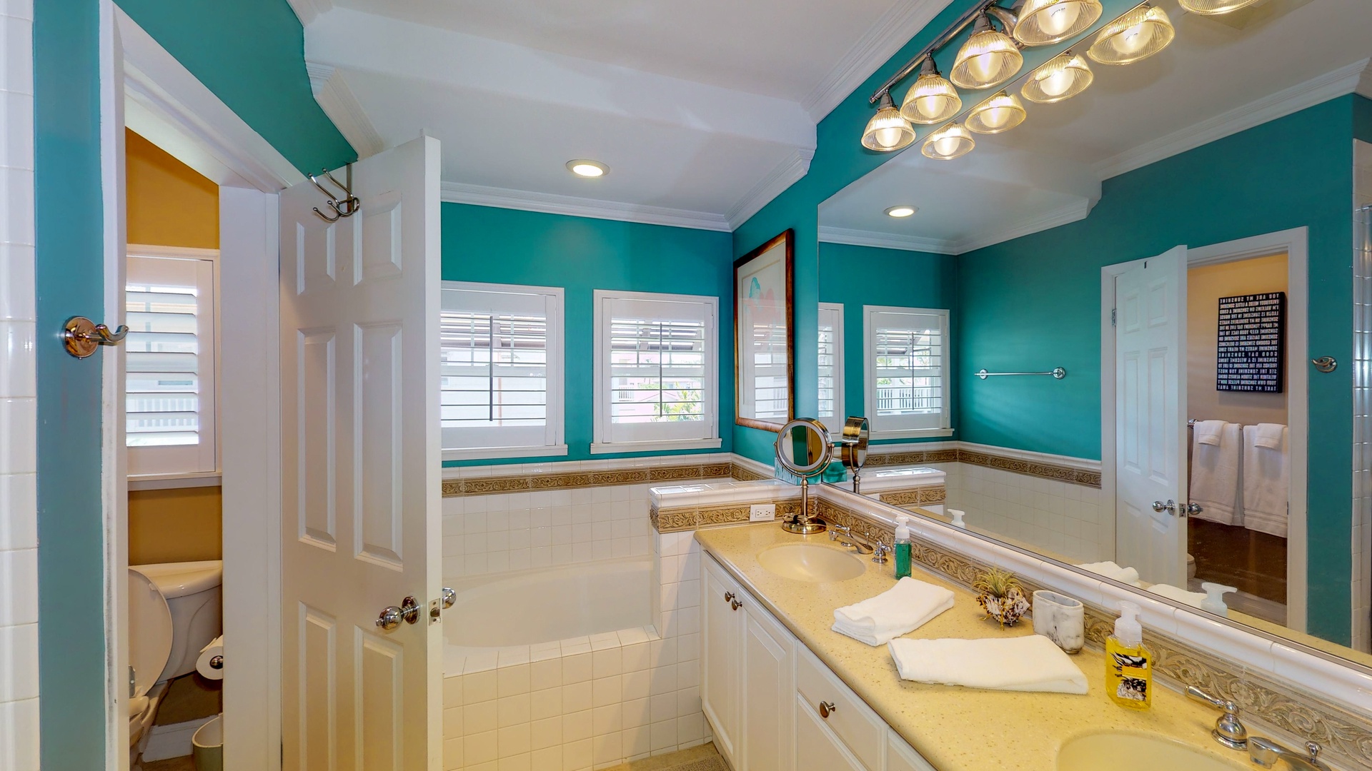 Kapolei Vacation Rentals, Coconut Plantation 1200-4 - The primary bathroom has twin sinks, and natural light.
