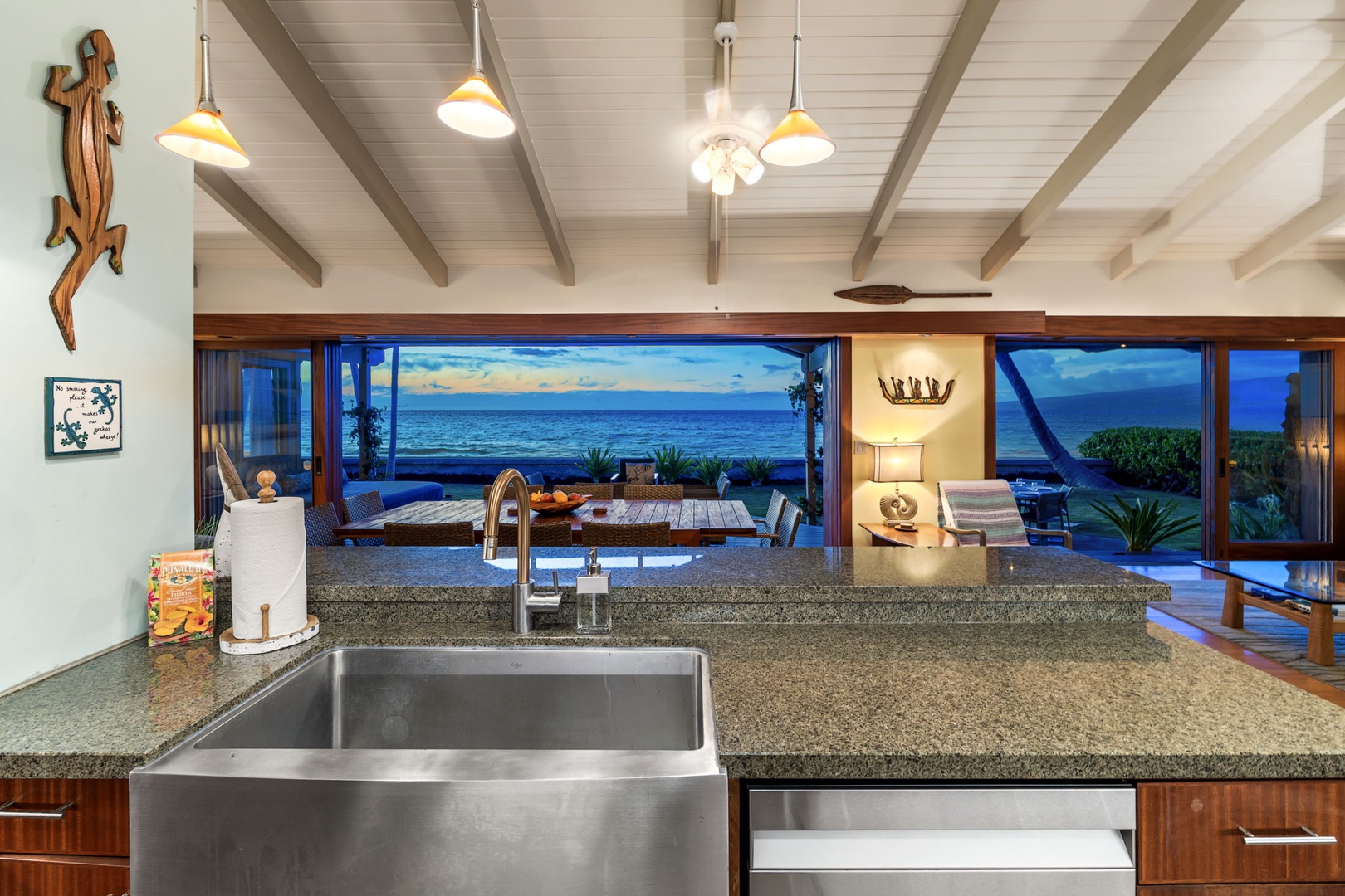Kamuela Vacation Rentals, Island Time Retreat - Prep dinner at the sink with the ocean out the window in front of you.