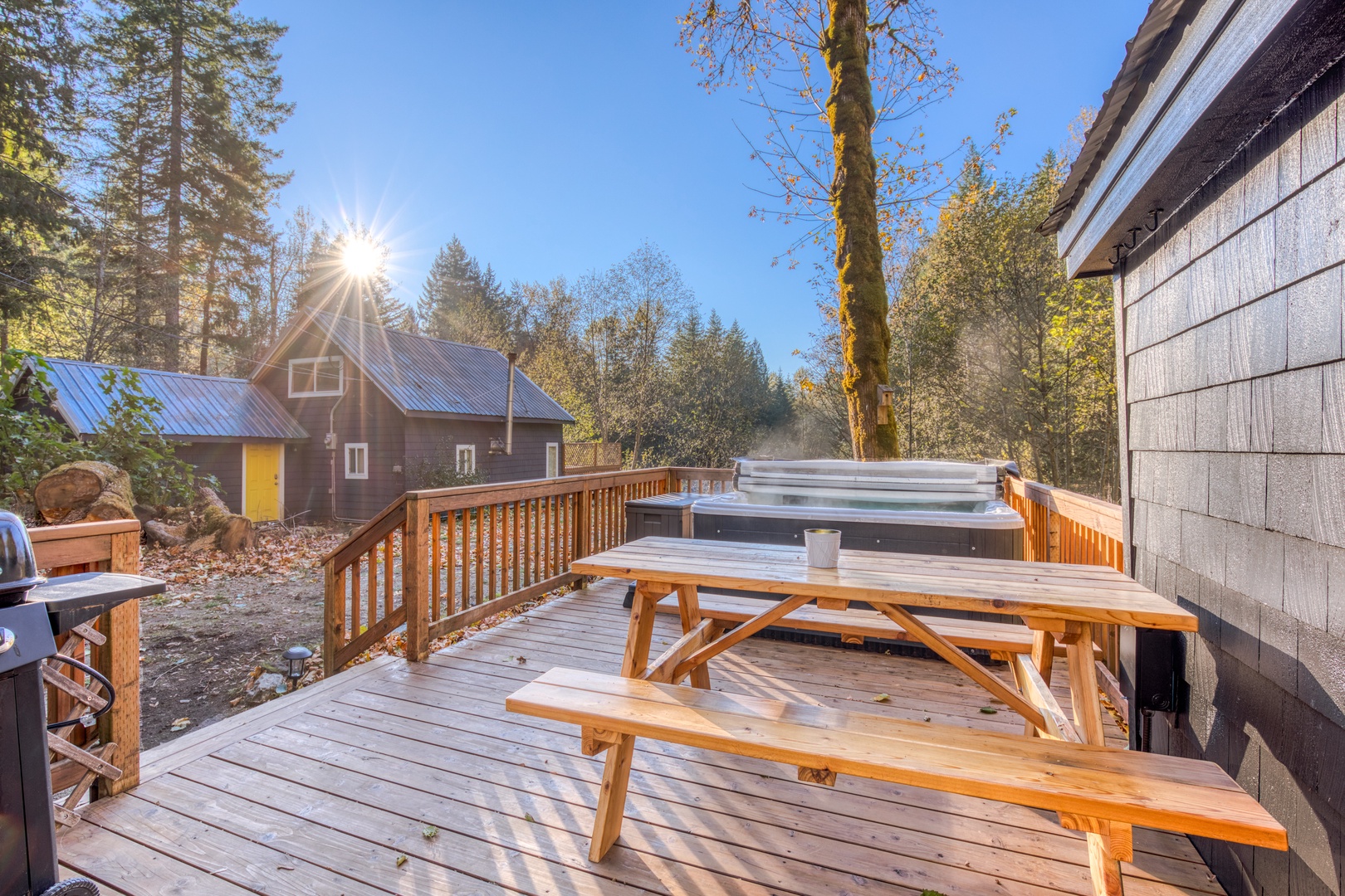 Rhododendron Vacation Rentals, Riverbend Cabin #1 - Deck with outdoor furniture