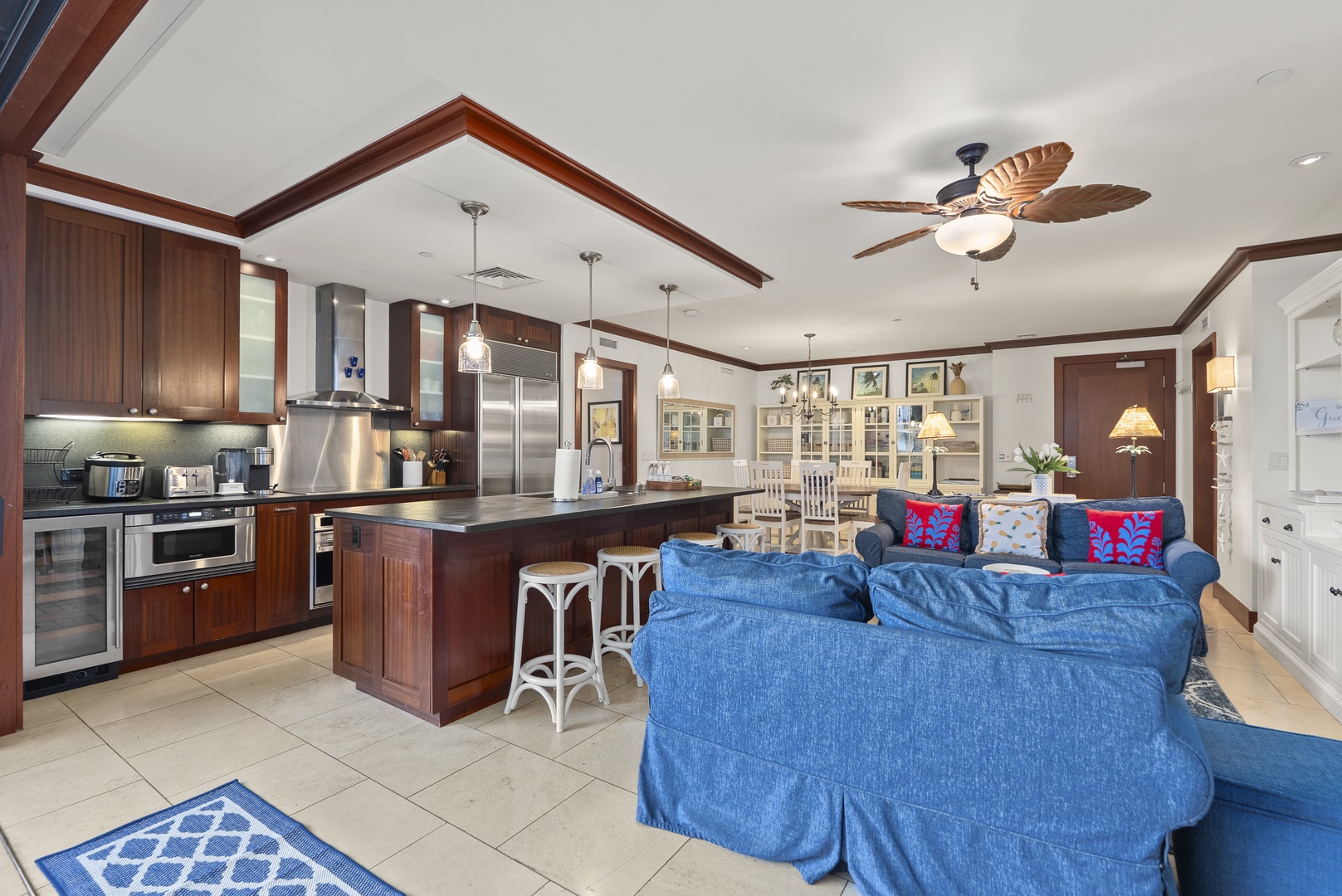Cook for six in a kitchen of dark wood cabinetry and counter space that never runs out.