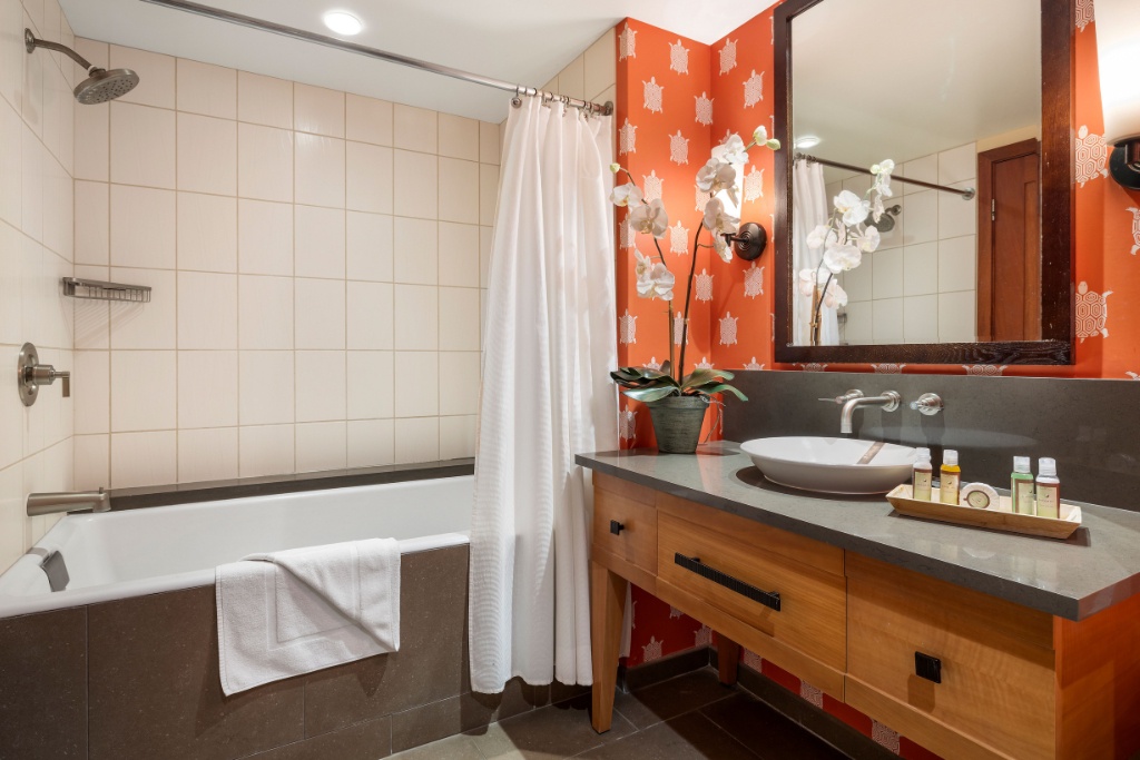 Kapolei Vacation Rentals, Ko Olina Beach Villas B410 - Modern second bathroom with a bathtub and shower combination.