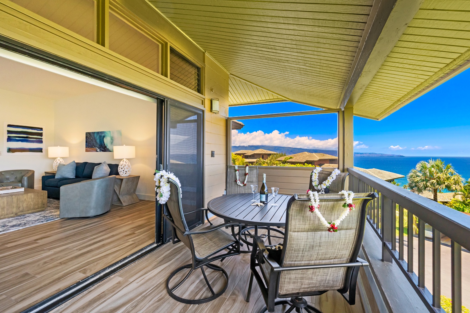 Lahaina Vacation Rentals, Kapalua Ridge 1421 - This private lanai offers stunning mountain views, making it the ideal setting to enjoy a refreshing drink or a quiet meal while taking in the natural beauty of the surroundings.