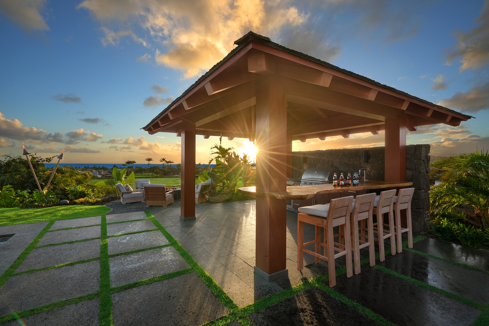 Koloa Vacation Rentals, Hale Ka Pua Ola at Kukuiula - Covered lanai with a built-in bar and grill, perfect for entertaining and sunset dining.