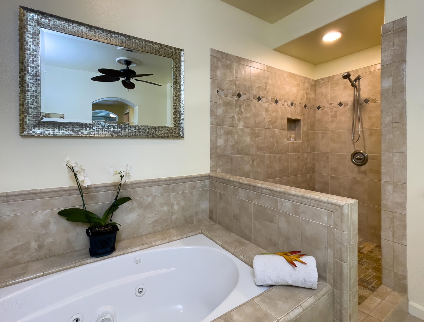 Kamuela Vacation Rentals, Mauna Lani Fairways #204 - Unwind with a soak in the spa-style Jacuzzi tub—your personal retreat after a day of island exploring or beach hopping.
