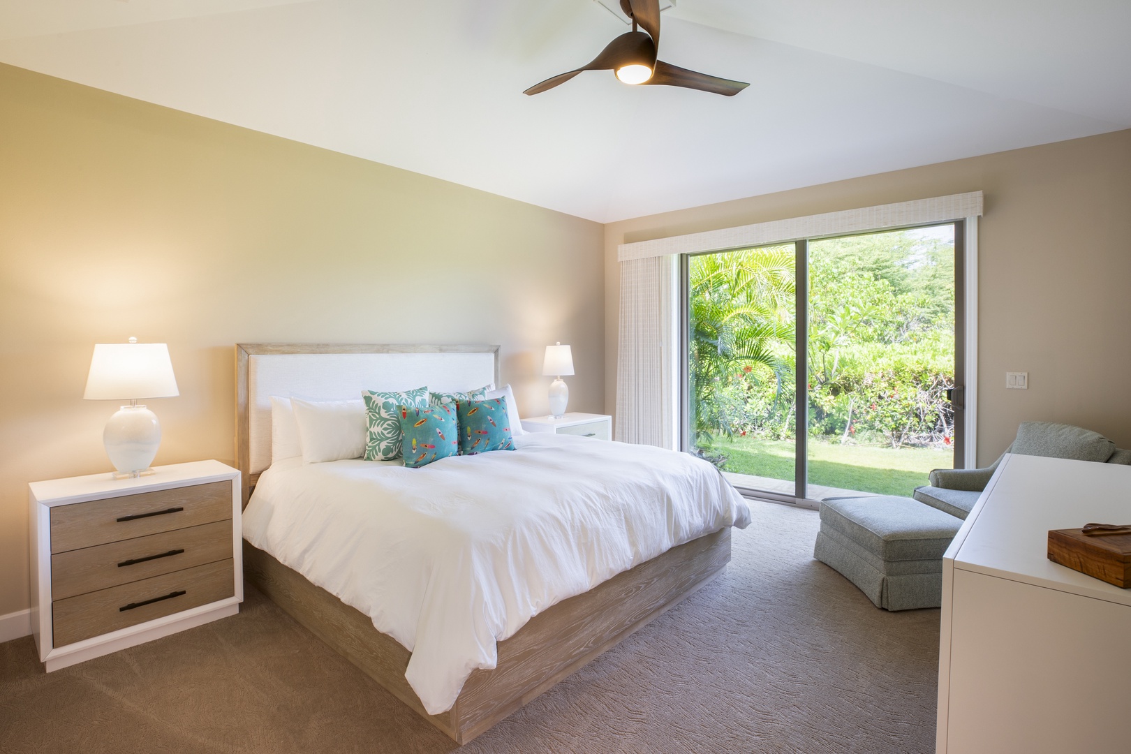Kamuela Vacation Rentals, Mauna Lani KaMilo #503 - Rest easy in the calming primary suite with a plush king bed and peaceful garden views.