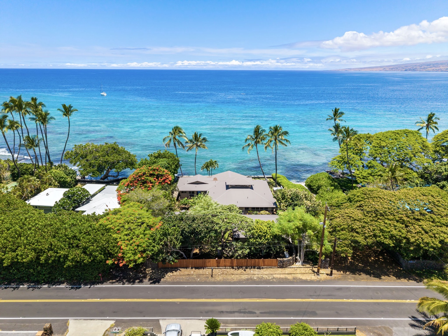 Kamuela Vacation Rentals, Island Time Retreat - Clear turquoise water runs along the coast just past the property.