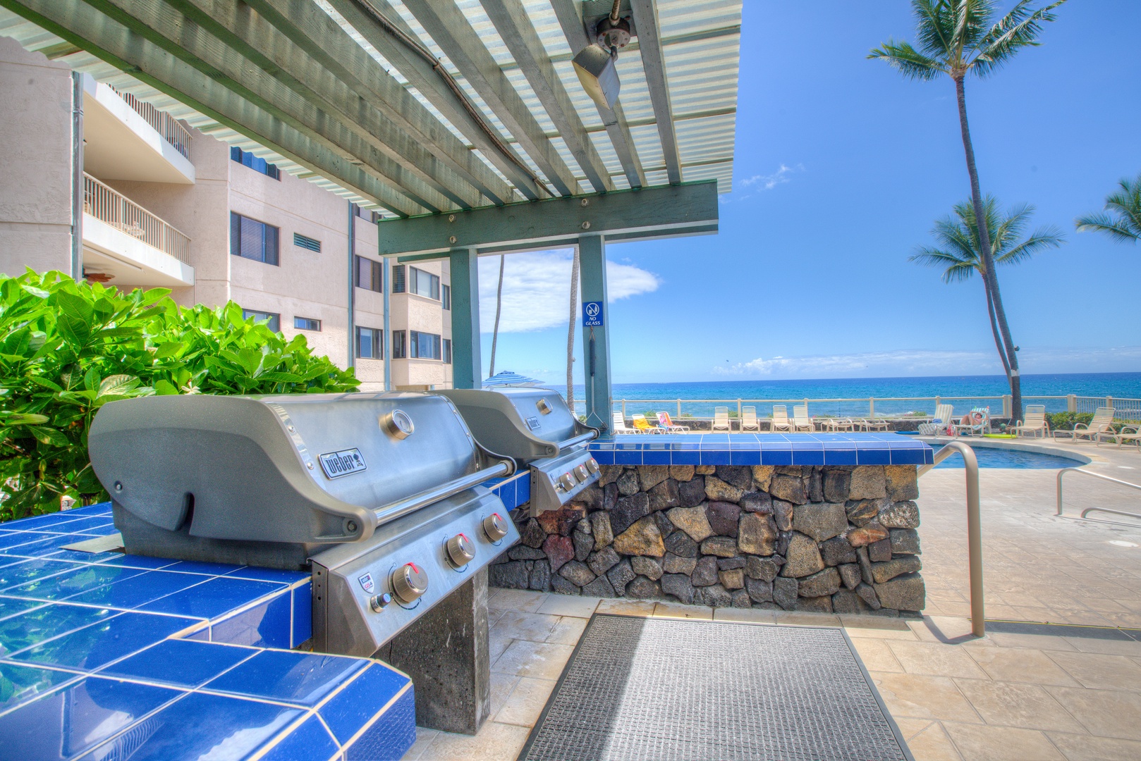 Kailua Kona Vacation Rentals, Kona Reef F11 - Barbecue Facilities and Pavilion located adjacent to the Oceanfront Pool.