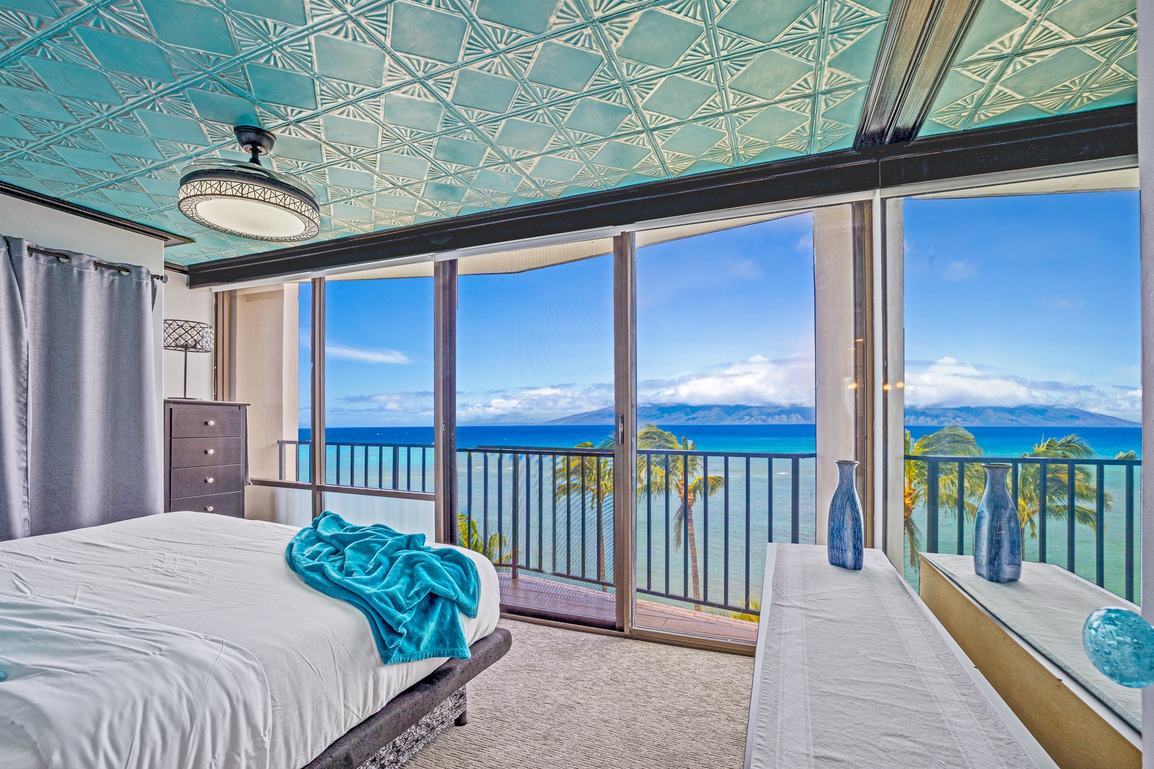 Lahaina Vacation Rentals, Valley Isle 804 - Wake up to breathtaking ocean views from the comfort of your bed. The floor-to-ceiling windows bring the serene beauty of the sea right into your room