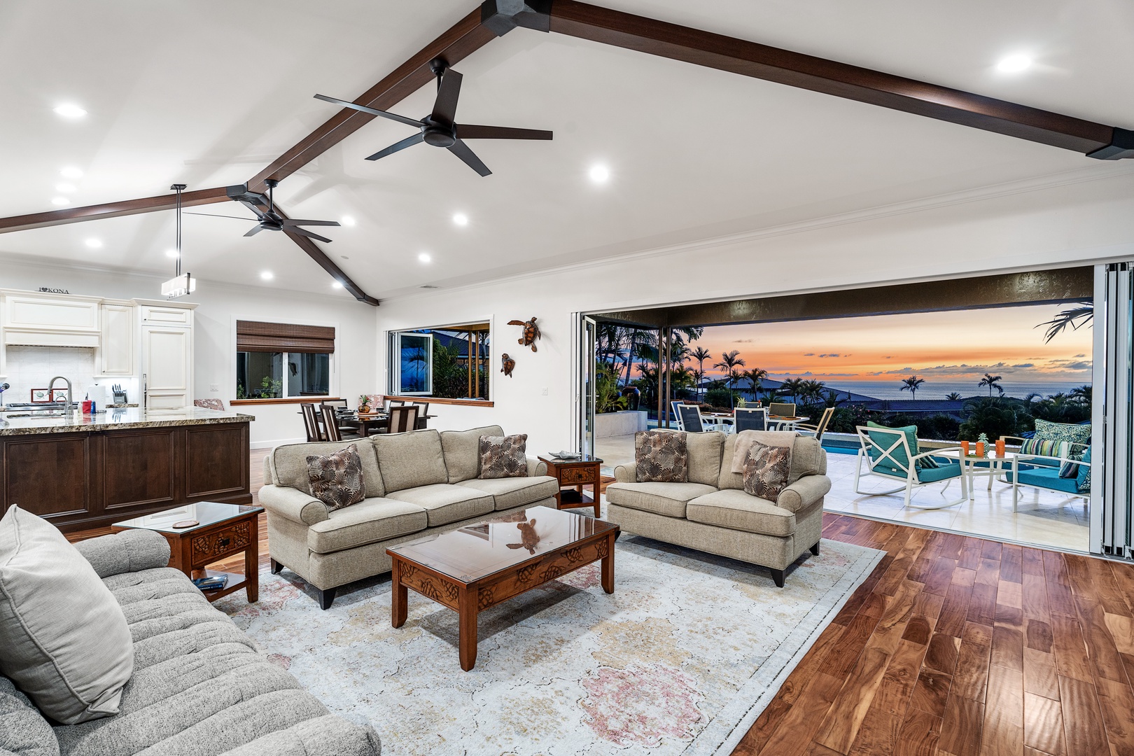 Kailua Kona Vacation Rentals, Ohana le'ale'a - As you enter, you'll be greeted by the open floor plan with 12-14ft vaulted ceilings, a modern updated design, and beautiful hardwood floors with natural travertine stone throughout the home