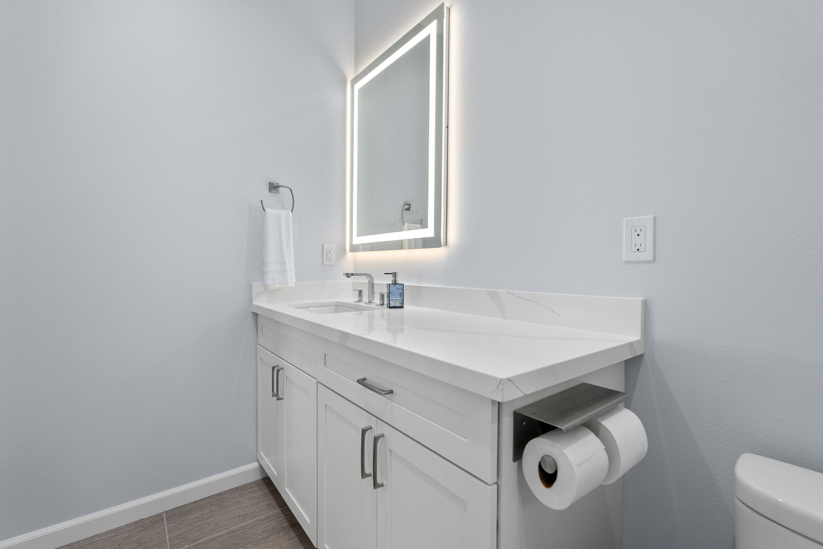 Waianae Vacation Rentals, Oceanfront Luxury Dream Estate - Second full guest bath with single vanity, sleek finishes, and warm lighting for added comfort.