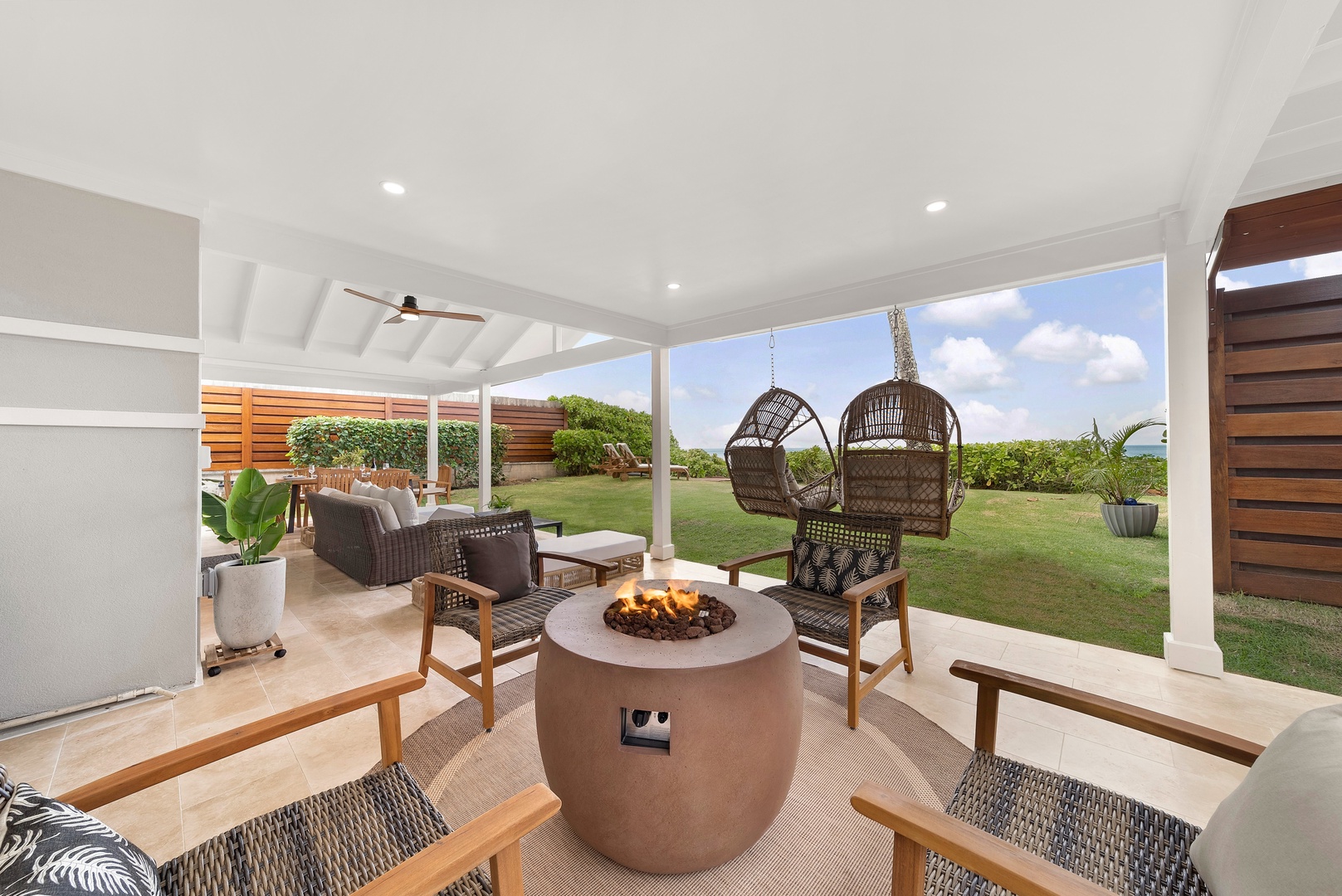 Haleiwa Vacation Rentals, Hale Nalu - Outdoor Lanai with plenty of seating areas for the whole family