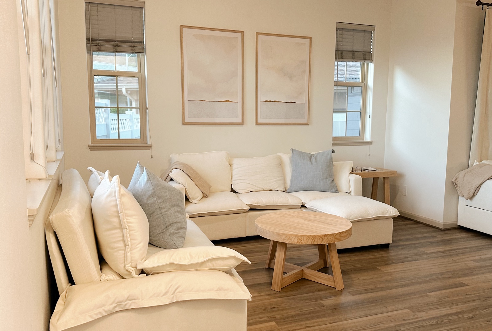 Makaha Valley Vacation Rentals, Makaha Valley Hale Kai** - Open living area with soft tones, ideal for games, movies, and shared meals.