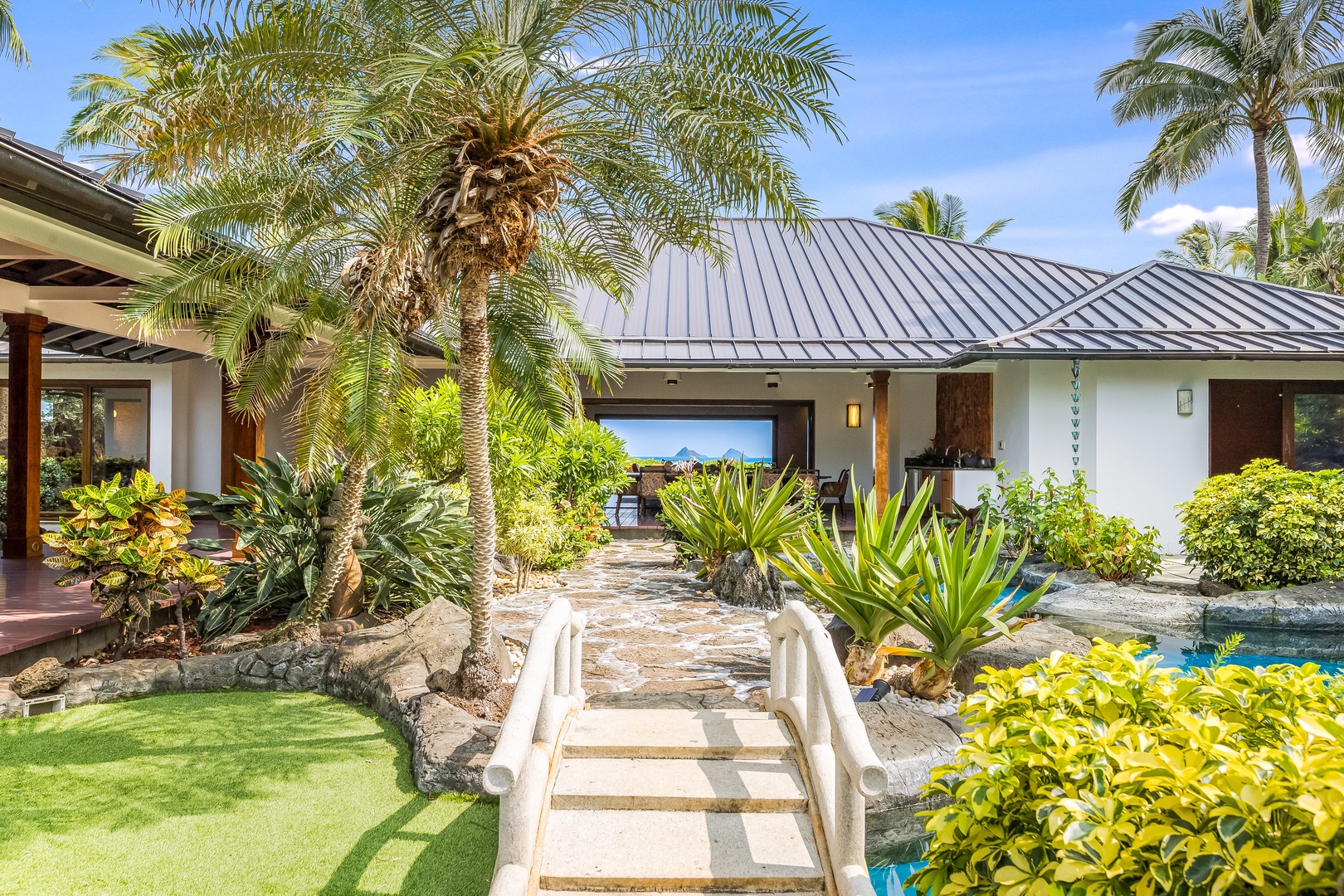 Kailua Vacation Rentals, Castle Point Estate - Stone paths connect serene courtyards and luxurious suites in true Hawaiian fashion.