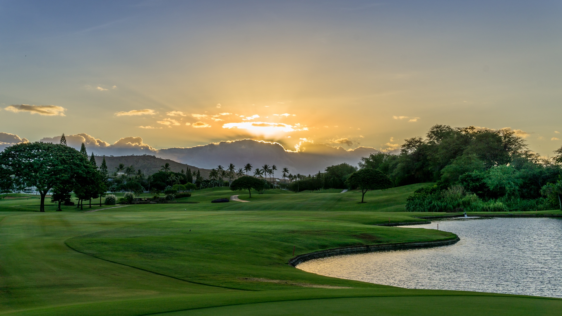Kapolei Vacation Rentals, Coconut Plantation 1086-4 - An Oahu Sunrise looking out over the golf course.