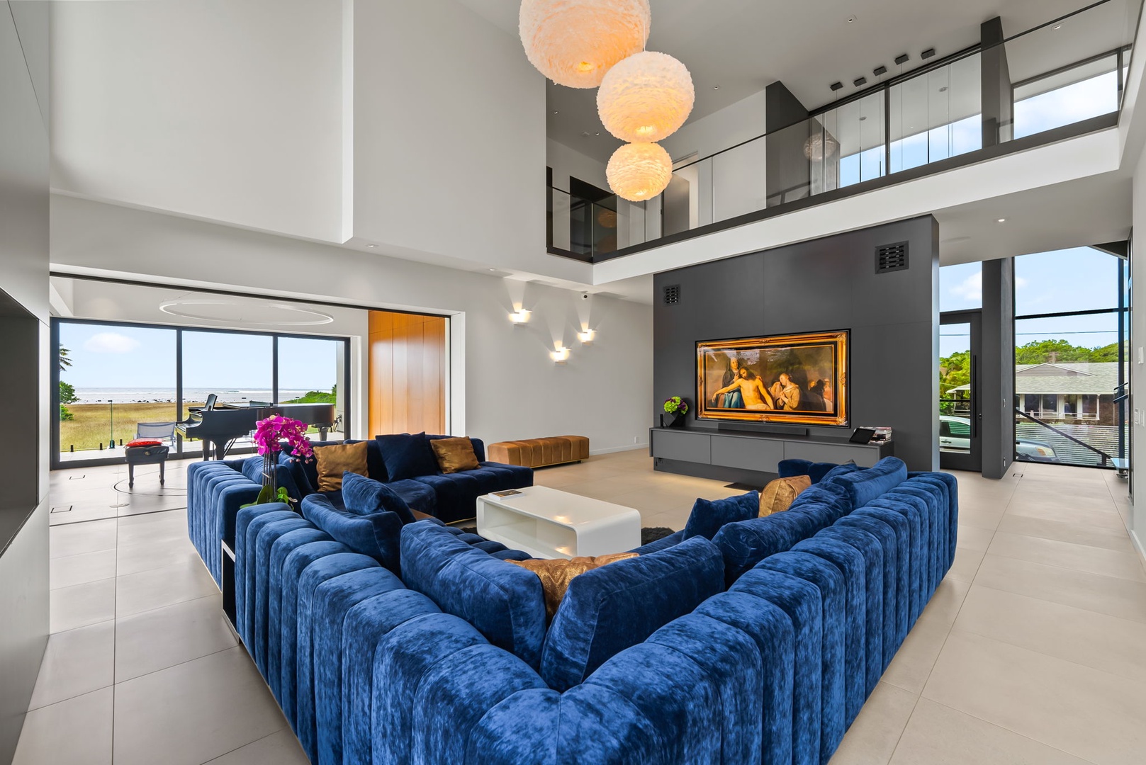 Honolulu Vacation Rentals, Ocean Villa Emilie - Sink into soft textures in this two-story great room, where island light dances across every carefully curated surface.