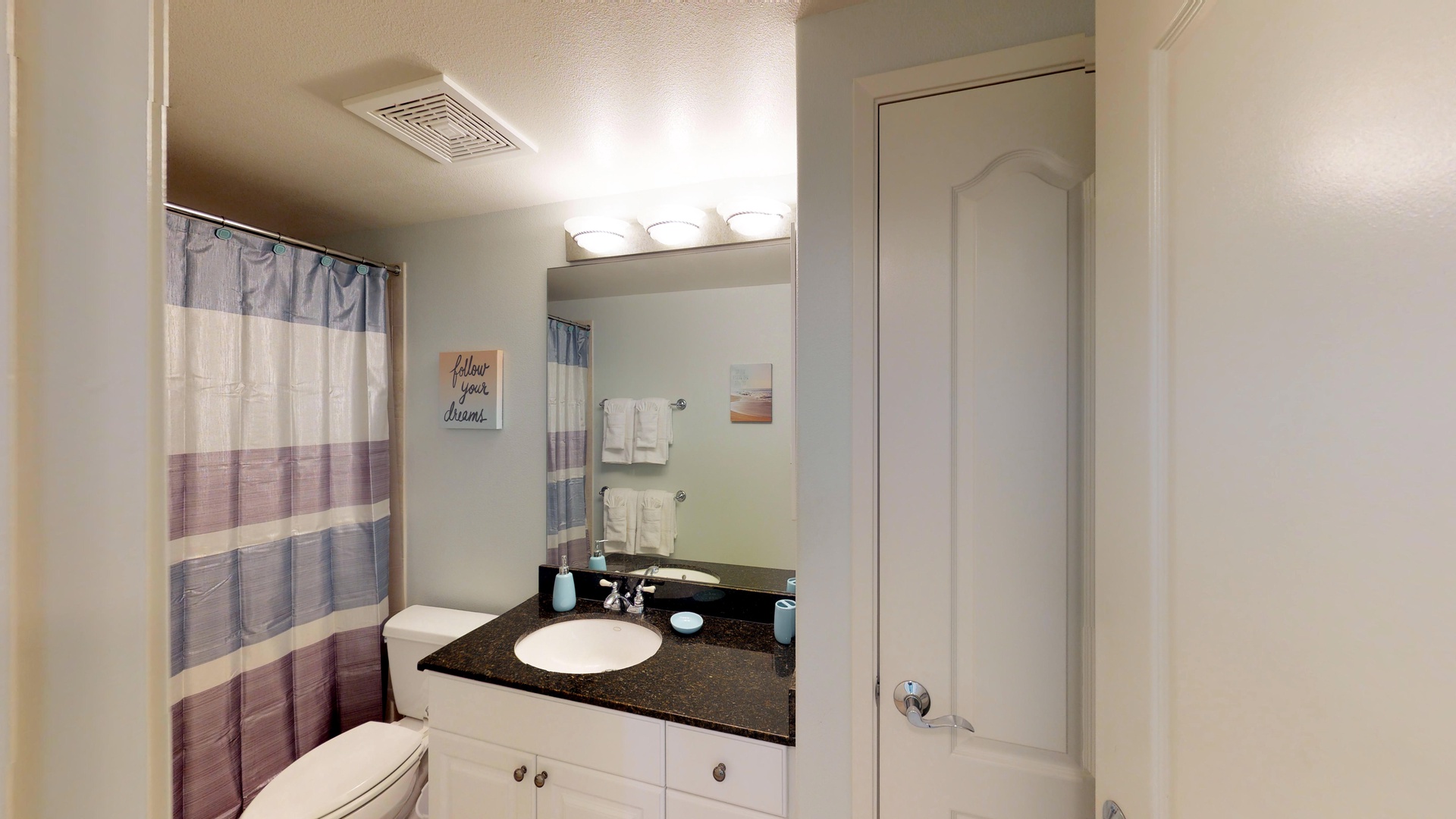 Kapolei Vacation Rentals, Ko Olina Kai 1035D - The downstairs guest bathroom with a shower.