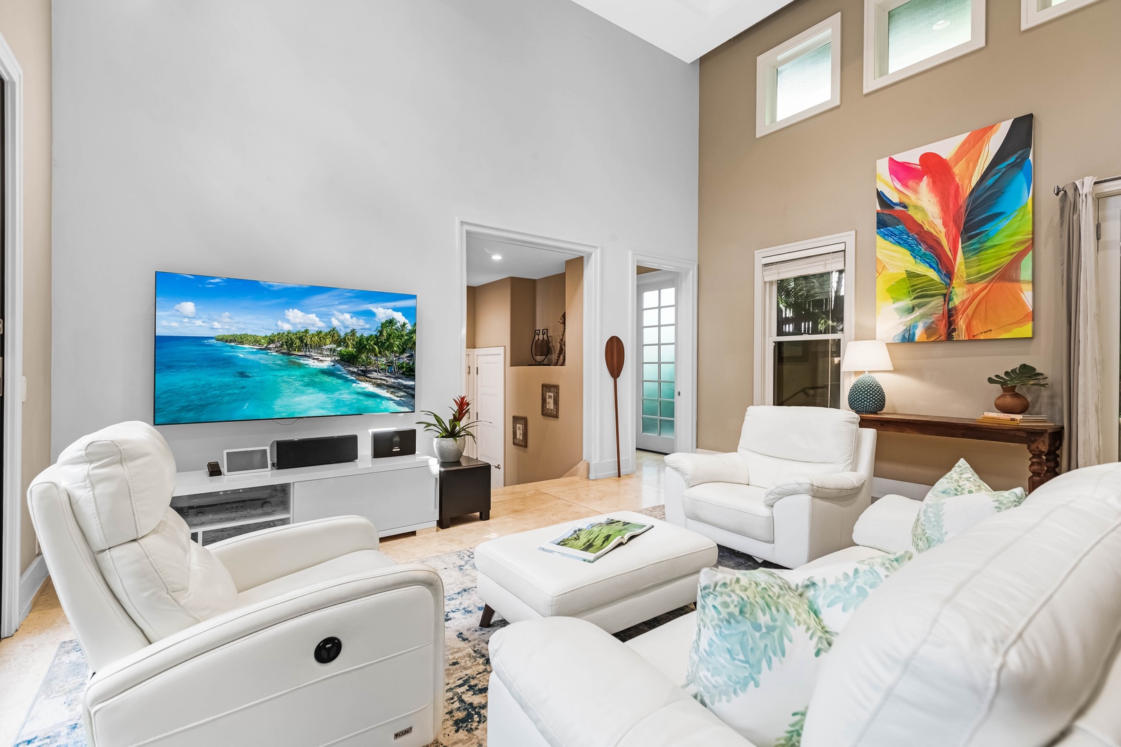 Honolulu Vacation Rentals, Pili Pono - Bright and breezy living room with a smart TV and cozy seating.